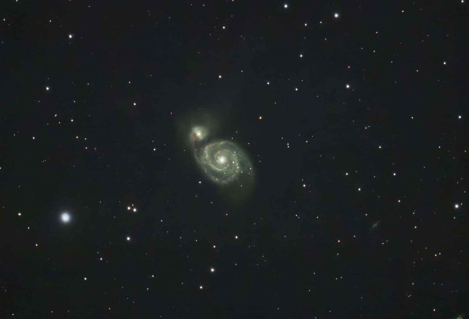 Finally moving even further out into inter-galactic space we have the Whirlpool Galaxy (M51a).The Whirlpool Galaxy is a grand spiral class galaxy and is interacting with a smaller galaxy M51b/NGC 5195.This galactic interaction is taking place 31 million light years from earth. This is a cropped image to show the interaction.