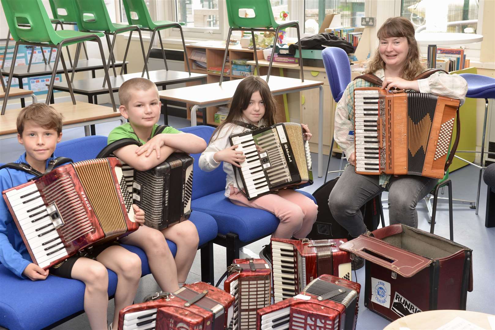 L to R Logan Sutherland, Kyle Keith, Emily Farquhar and accordion tutor Mairearad Green. Pic. Jim Johnston