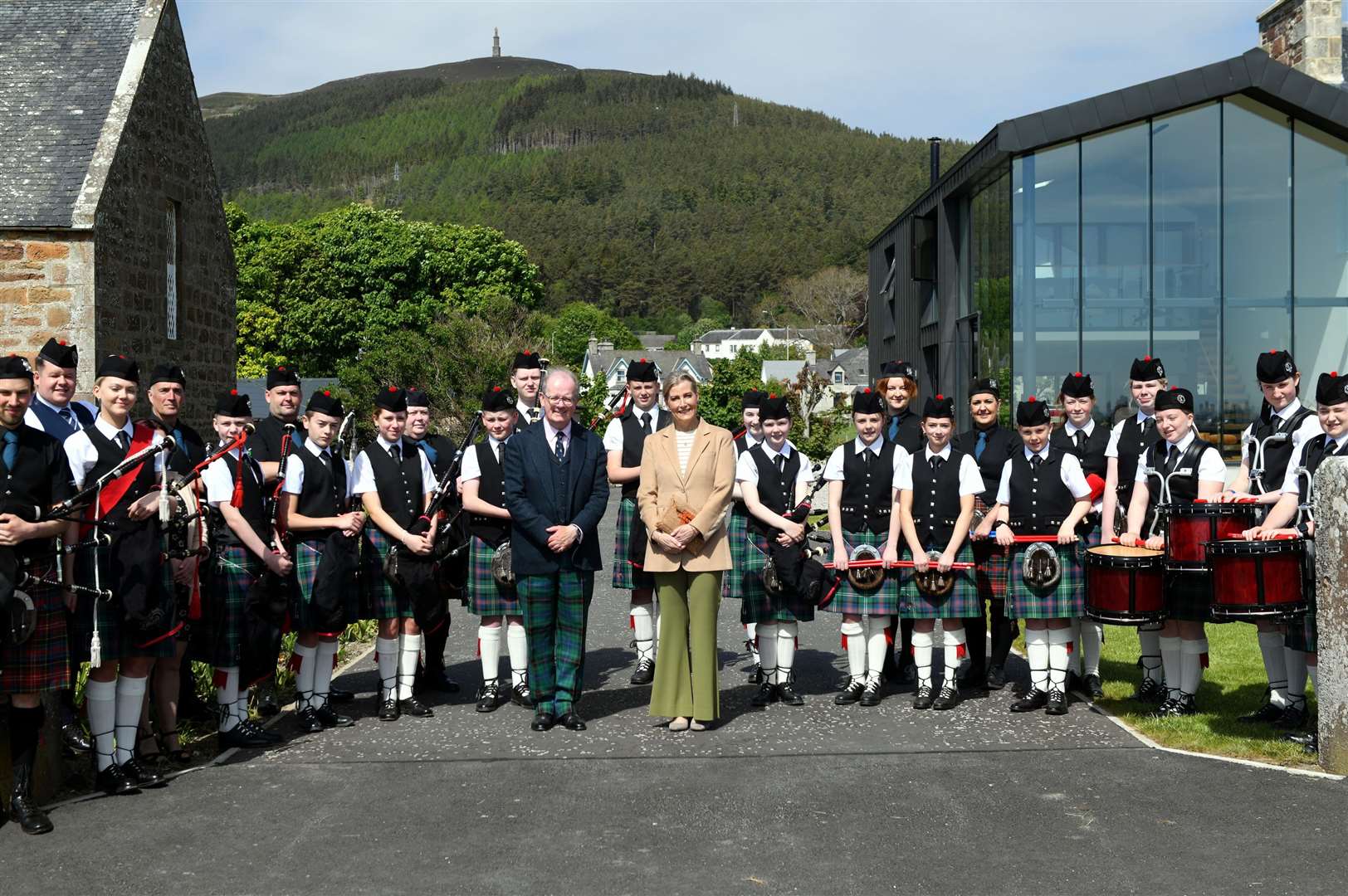 The royal couple pose with the band. Picture: James MacKenzie