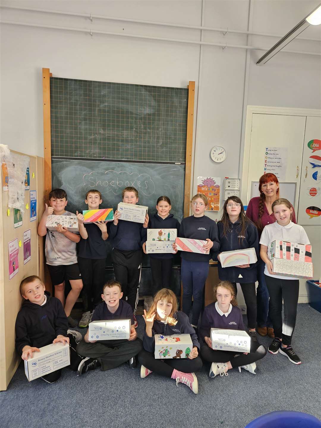 Helmsdale Primary School pupils, seen here with Rotarian Claudia MacGregor, are long-time supporters of the shoe box project.