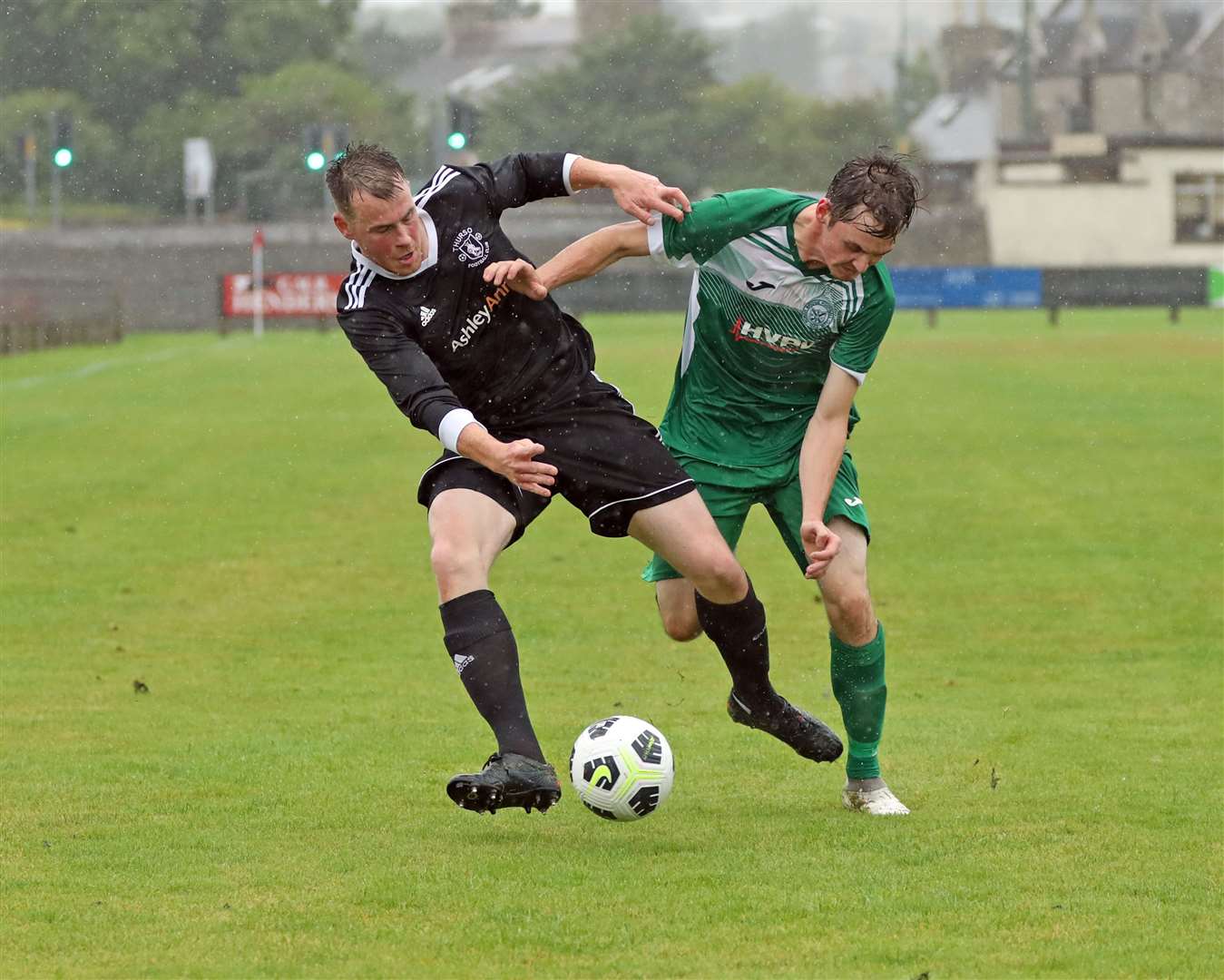 Bonar’s Andrew Gow, back available this weekend, tussles with Thurso’s Allan Munro in the latter’s recent 4–1 victory.