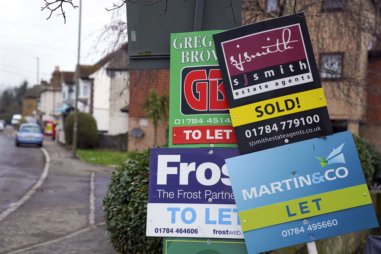 House sales are slowing because of higher interest rates and cost-of-living uncertainty (Steve Parsons/PA)