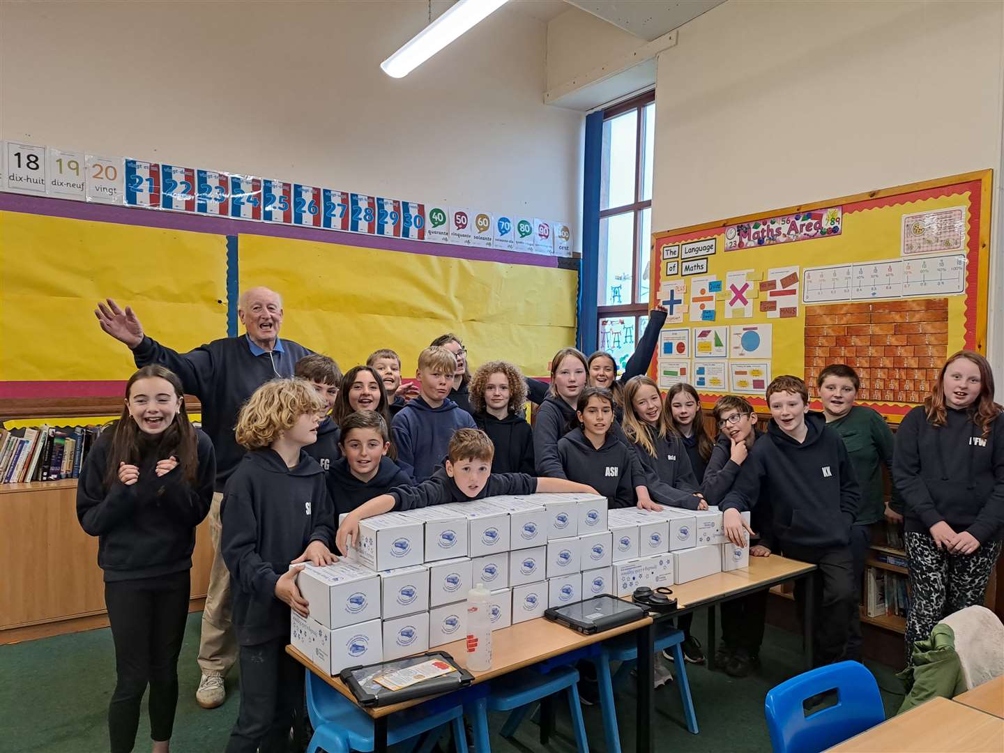 Dornoch Primary RotaKids have filled some 60 shoe boxes with a little help from Rotarian Alistair Risk.