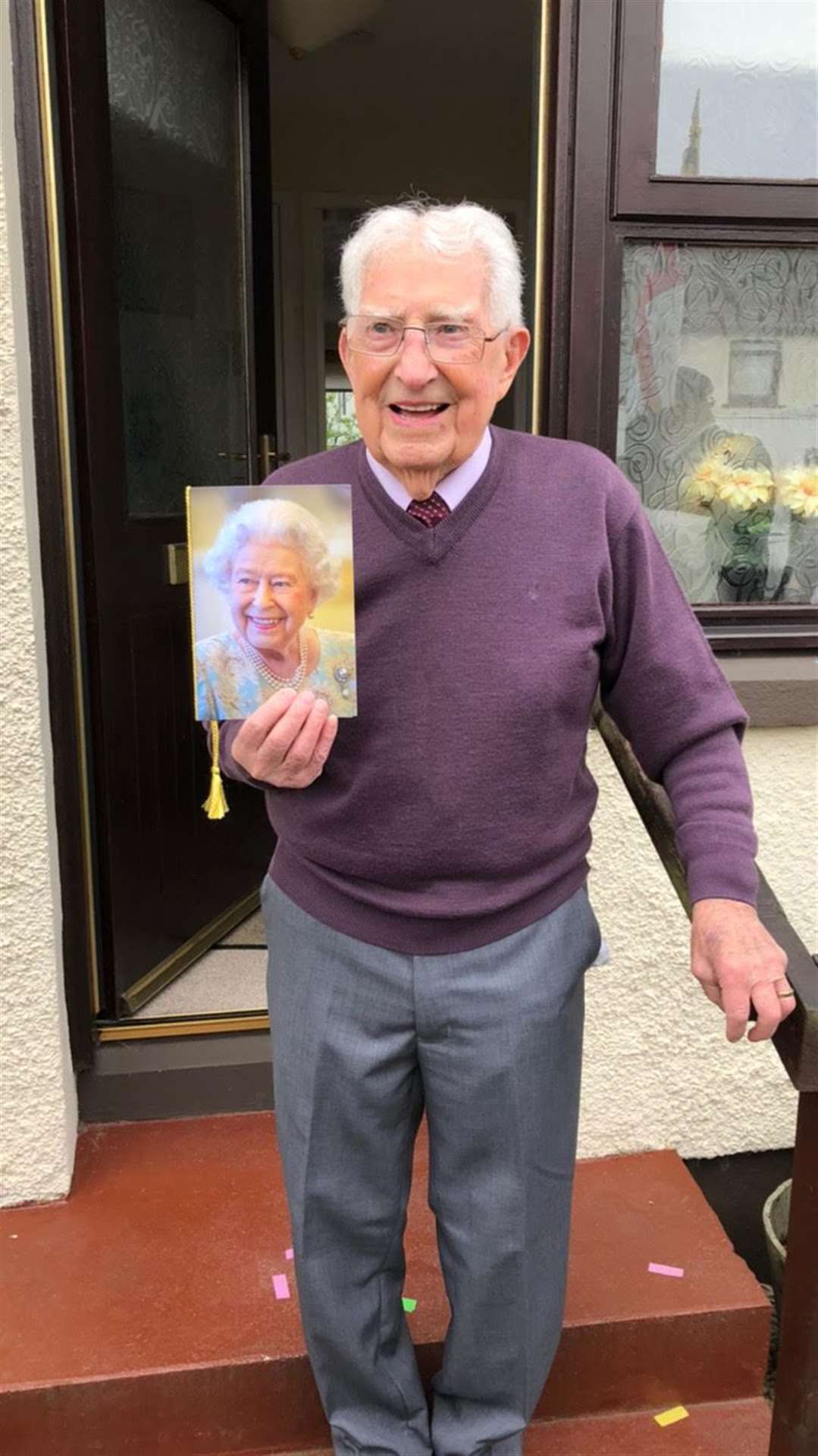 Davie Beaumont with his birthday card from the Queen.