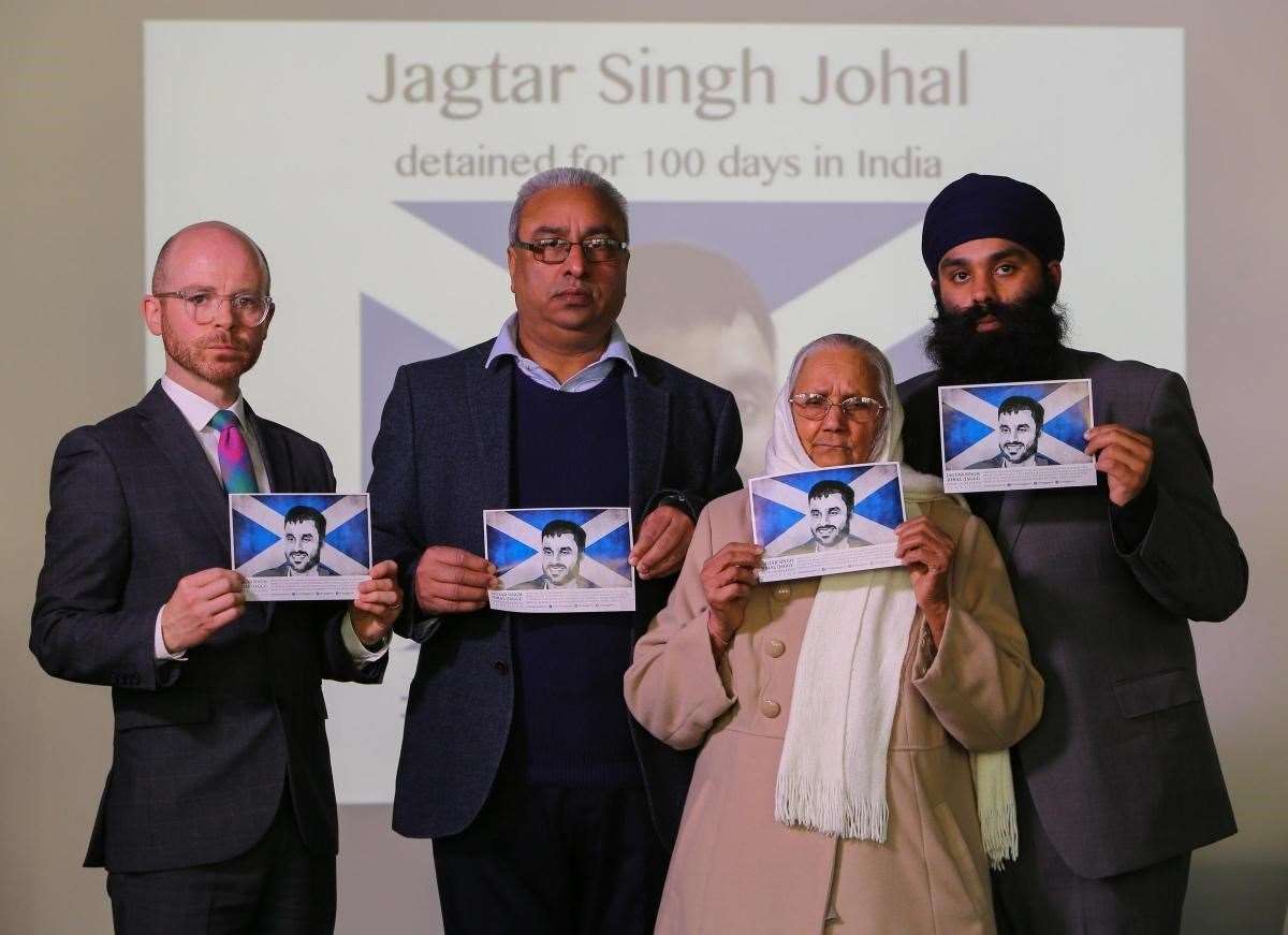 West Dunbartonshire SNP MP Martin Docherty-Hughes with Jagtar Singh Johal’s family (Martin Docherty-Hughes/PA)