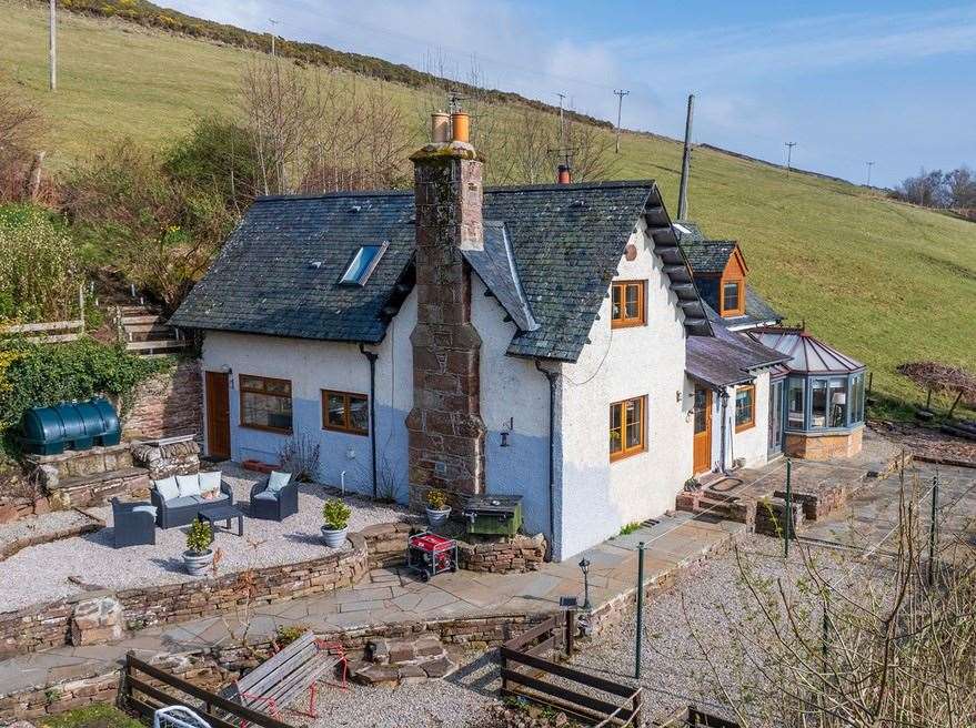 Hill Cottage was originally set into an old quarry, which is now no longer in use. Picture: Hamish Homes