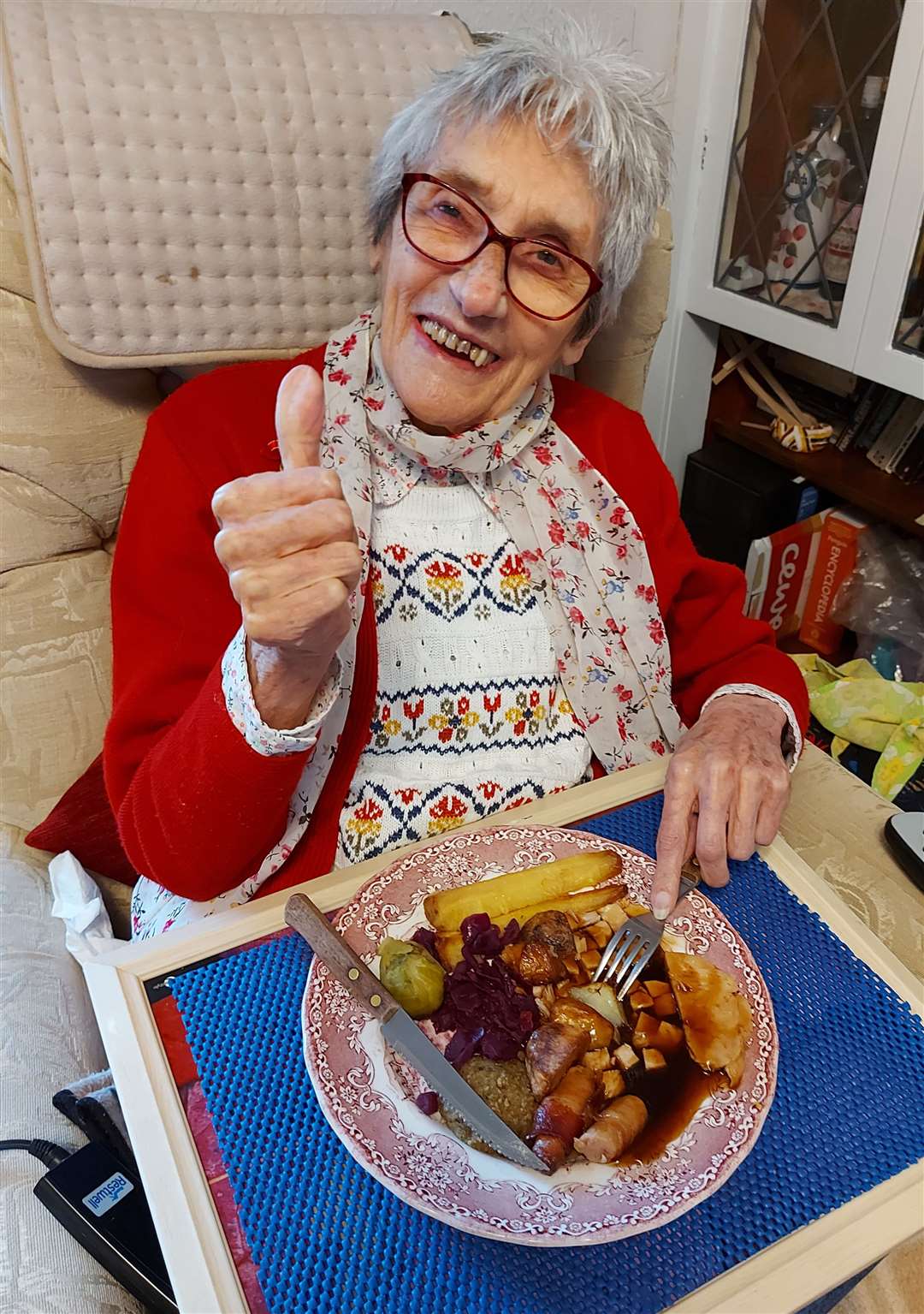 June Taylor, Tongue, gives a thumbs up to her Christmas dinner.