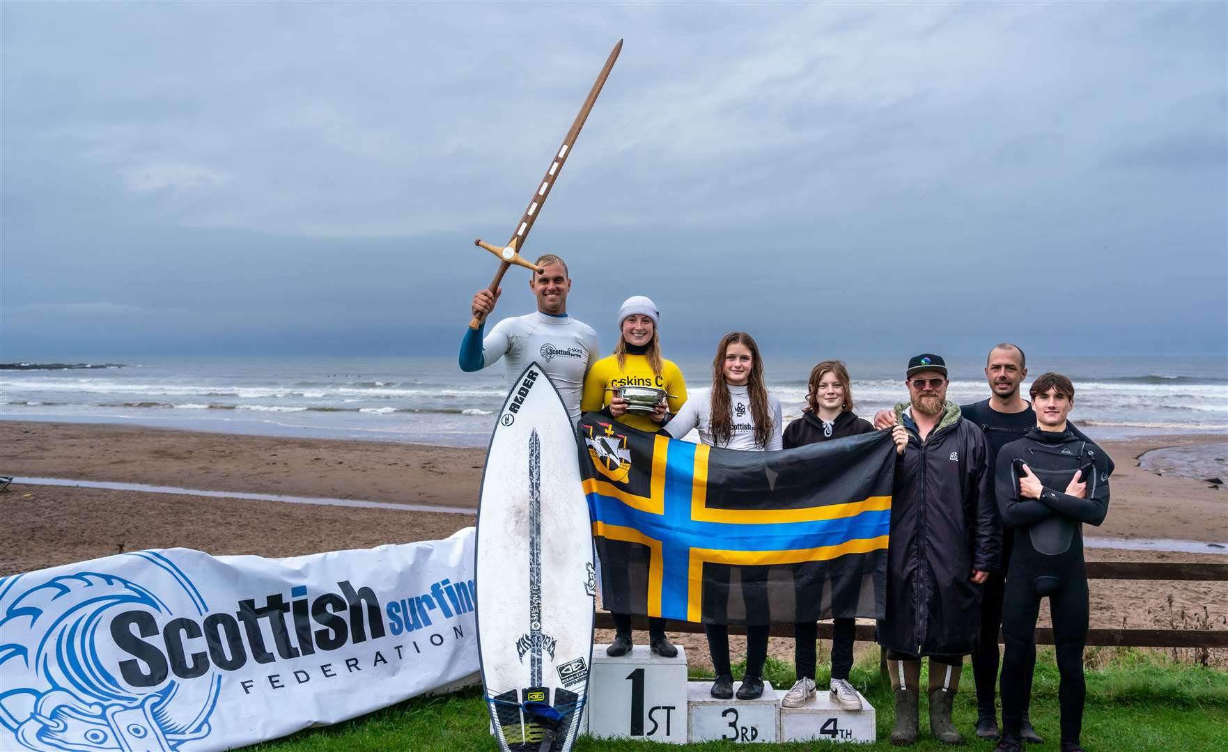 The victorious North Shore Surf Club team with the Gathering of the Clans sword and quaich. Picture: Malcolm Anderson