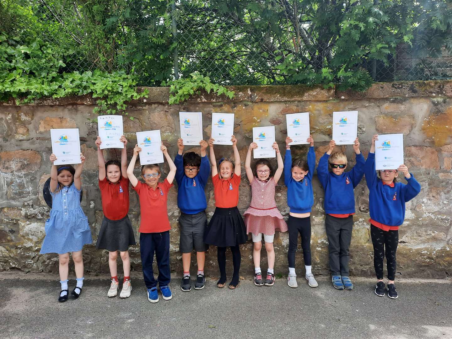 Pupils from Crown Primary with their Environment Protection Scotland colouring books with which they are learning about Clean Air Day.
