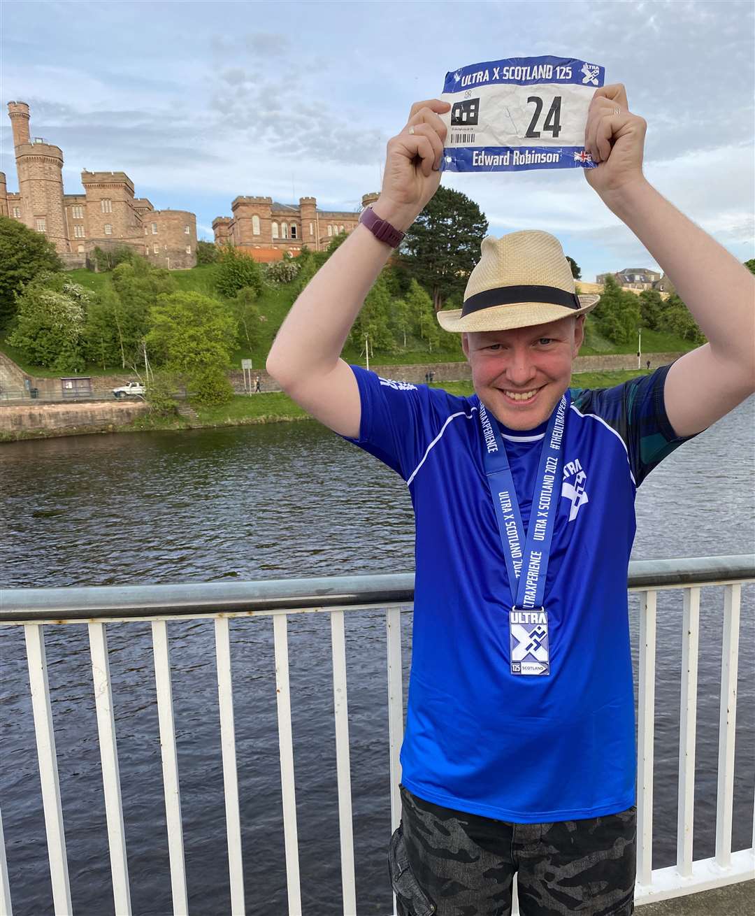 Ed Robinson in Inverness with his medal after completing the Ultra X 125 Scotland.