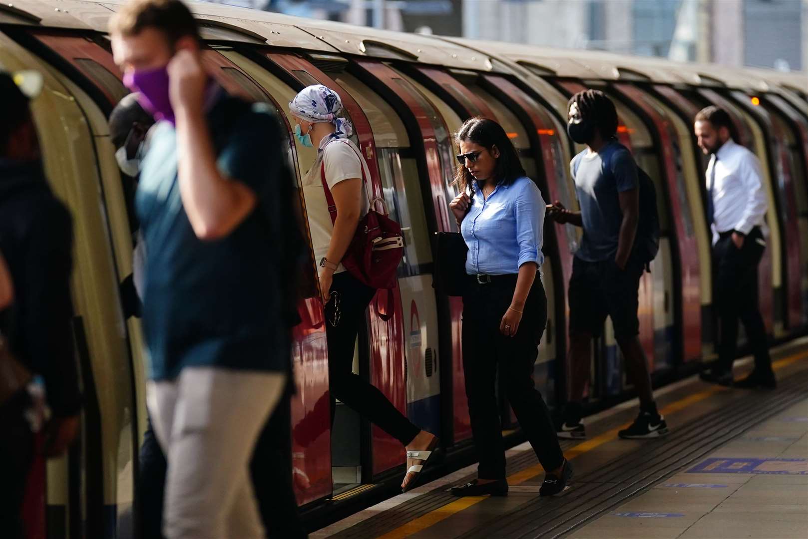 Commuters have started to return as Covid-19 restrictions ease, with many bosses encouraging a return to the office (Victoria Jones/PA)