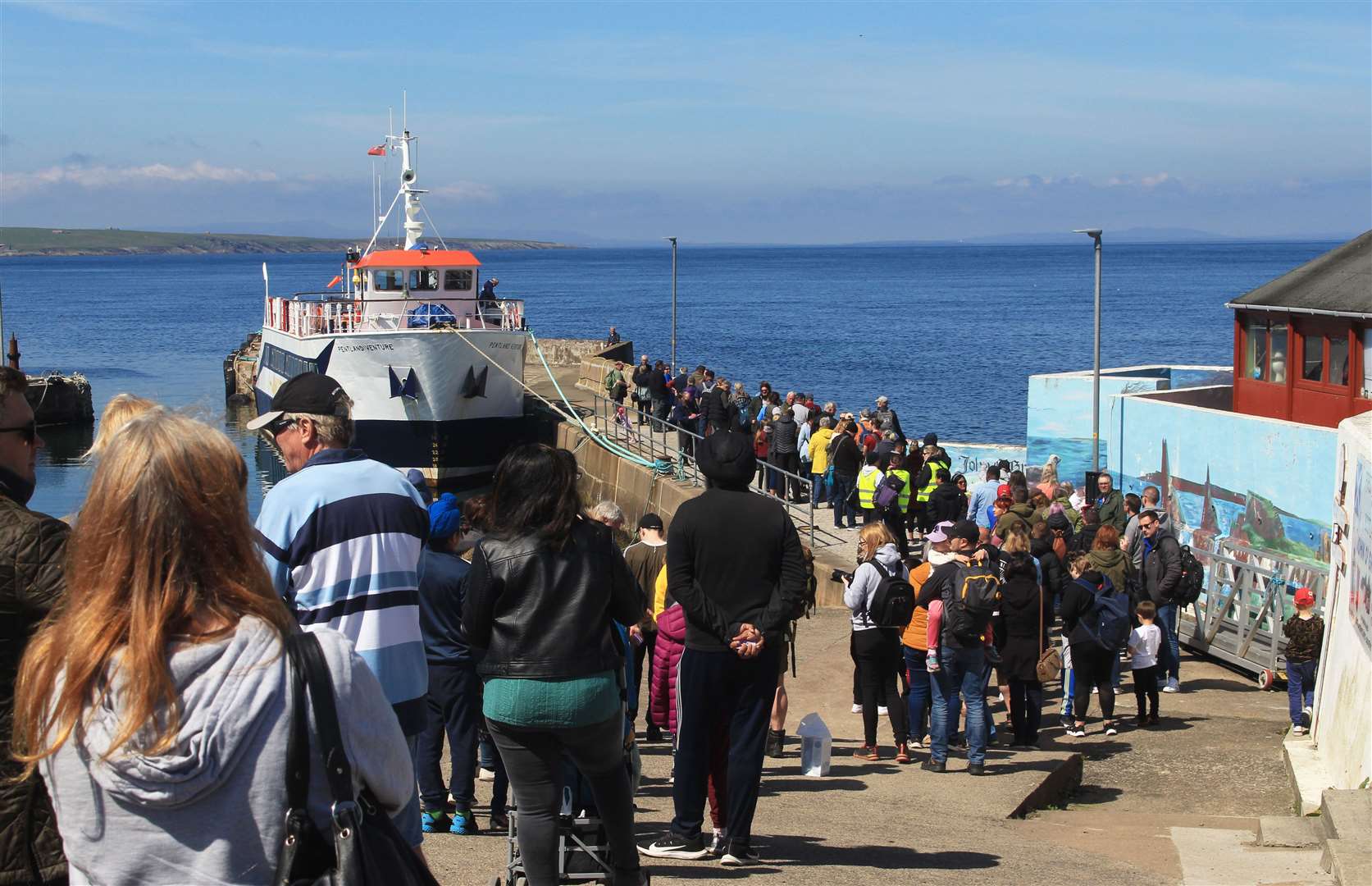 Passengers queuing for a trip on the Pentland Venture at John O'Groats. Picture: Alan Hendry