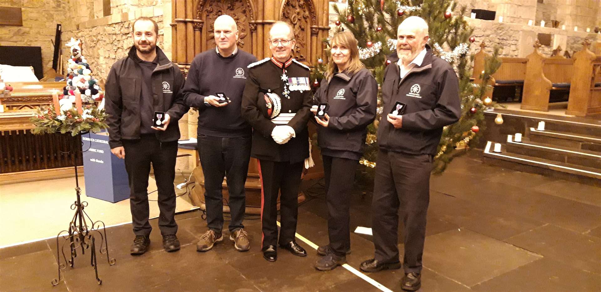 Major General Marriott (centre) with, from left, Gareth Dixon, Antony Hope, Christine Graham and Neil Dalton.
