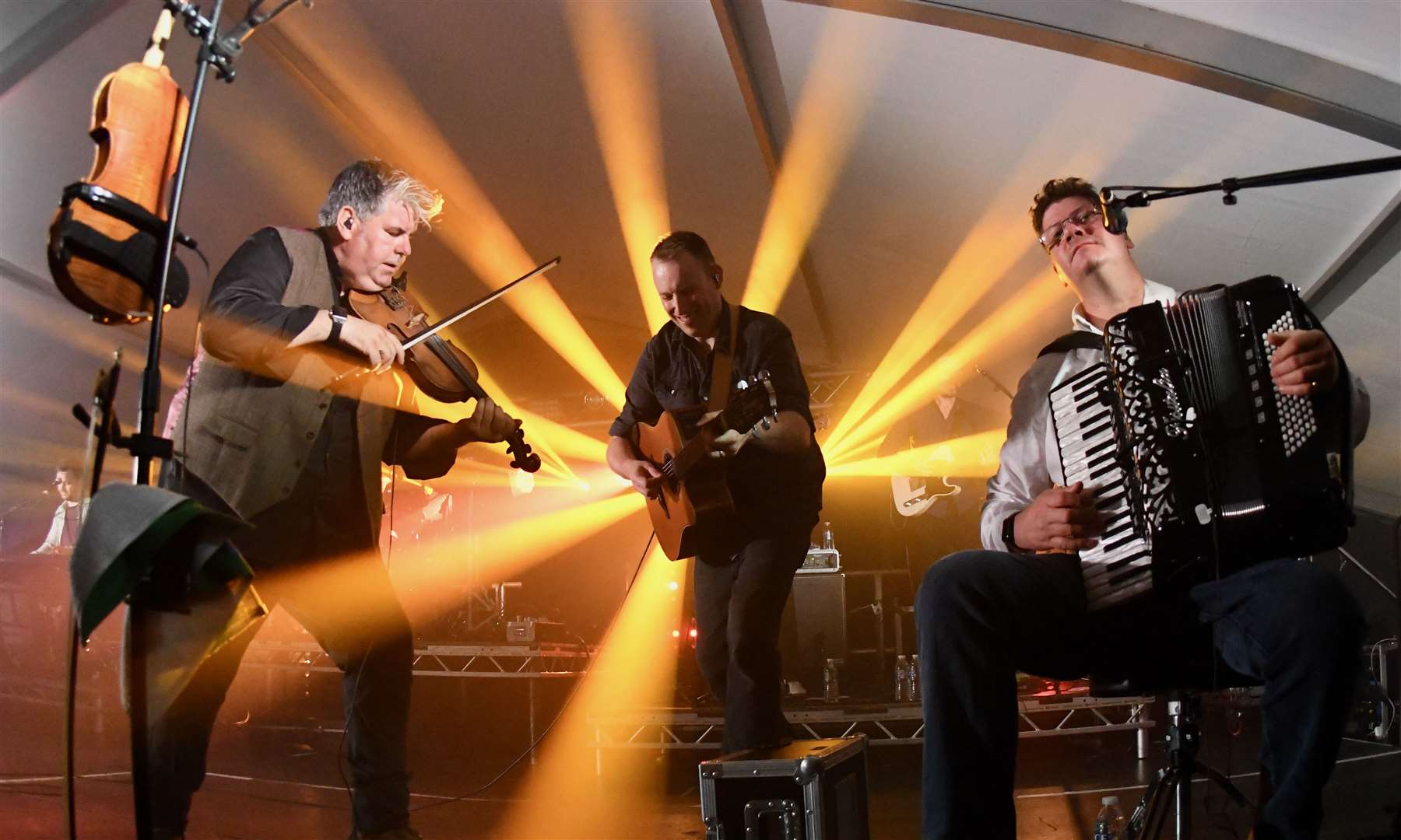 Skipinnish putting in a high-energy performance at Tunes By the Dunes 2023. © John Wright Studio