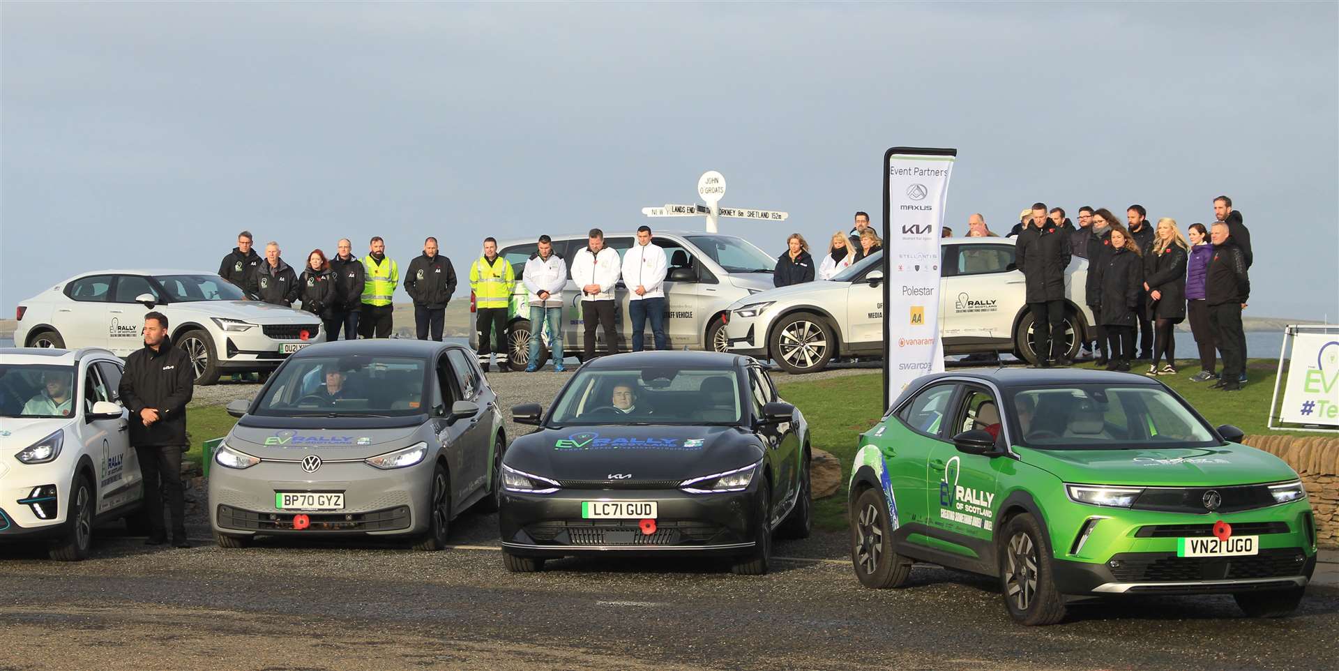 Electric vehicles at John O'Groats last November for the EV Rally of Scotland, coinciding with the COP26 climate change conference.  Drivers marked Armistice Day with a two-minute silence.  Photo: Alan Hendry