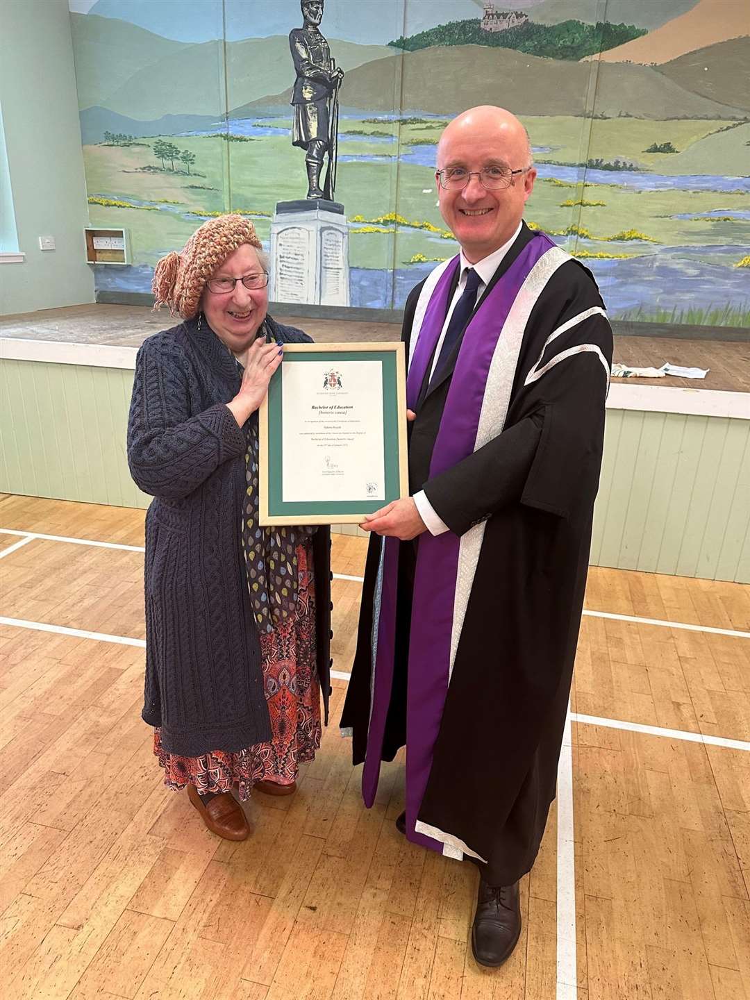 Valerie was then presented with her degree certificate by Professor Simco, on behalf of Liverpool Hope University. Photo: KoSDT