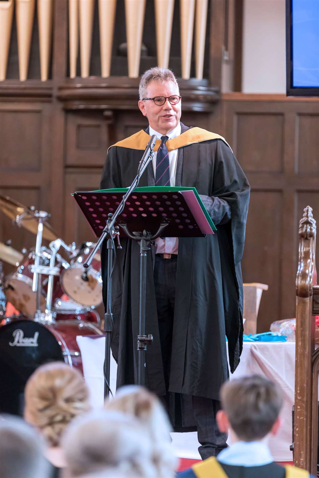 Principal Donald MacBeath addresses graduands before receiving their awards during last year's graduation ceremony in Thurso.