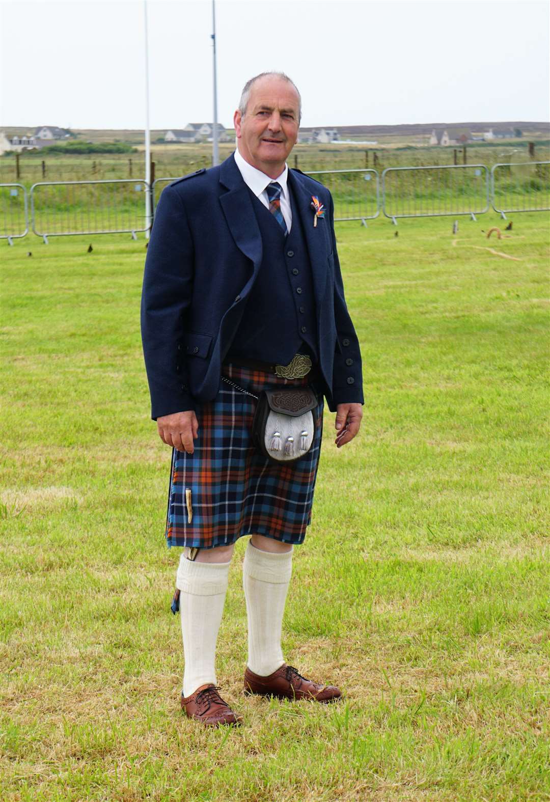 Convenor Henry Gunn wears the new Mey Highland Games tartan. Picture: DGS