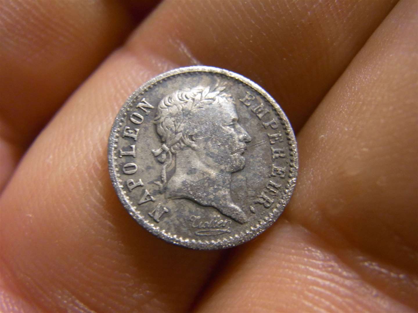 Michael Gallon found this tiny silver quarter franc of Napoleon Bonaparte at Fortrose.