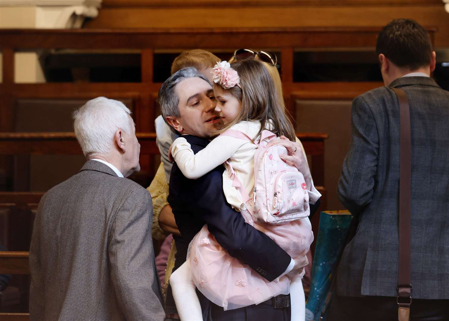 Fine Gael leader Simon Harris with his daughter Saoirse in the Dail Chamber, Leinster House, Dublin ahead of being nominated as Taoiseach (Maxwell Photography/PA)