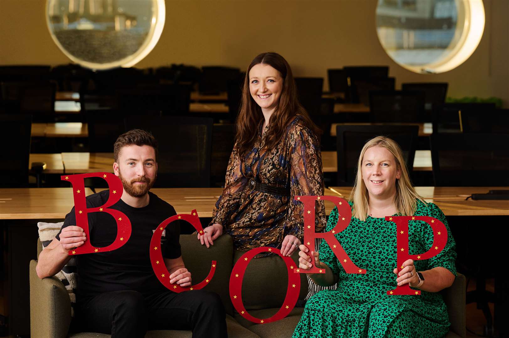 The Muckle Media management team of (left to right) directors Chris Bachelor and Linsay Brown and managing director Nathalie Agnew celebrate becoming the first Scottish PR company to achieve B-Corp status
