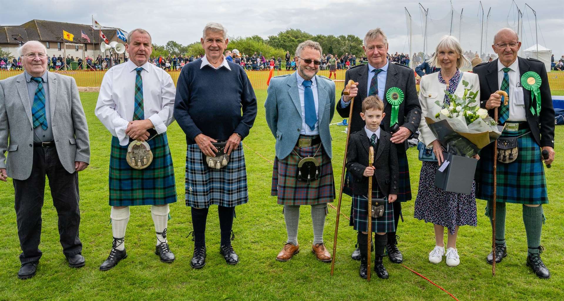 2023 Chieftain Jim Campbell (fifth left), his grandson Jack and wife Teresa with, from left, past chieftains Innes Matheson, George Gunn Alistair Ross and Jimmy MacDonald. Far left is games president Willie MacKay. Picture: Andy Kirby.