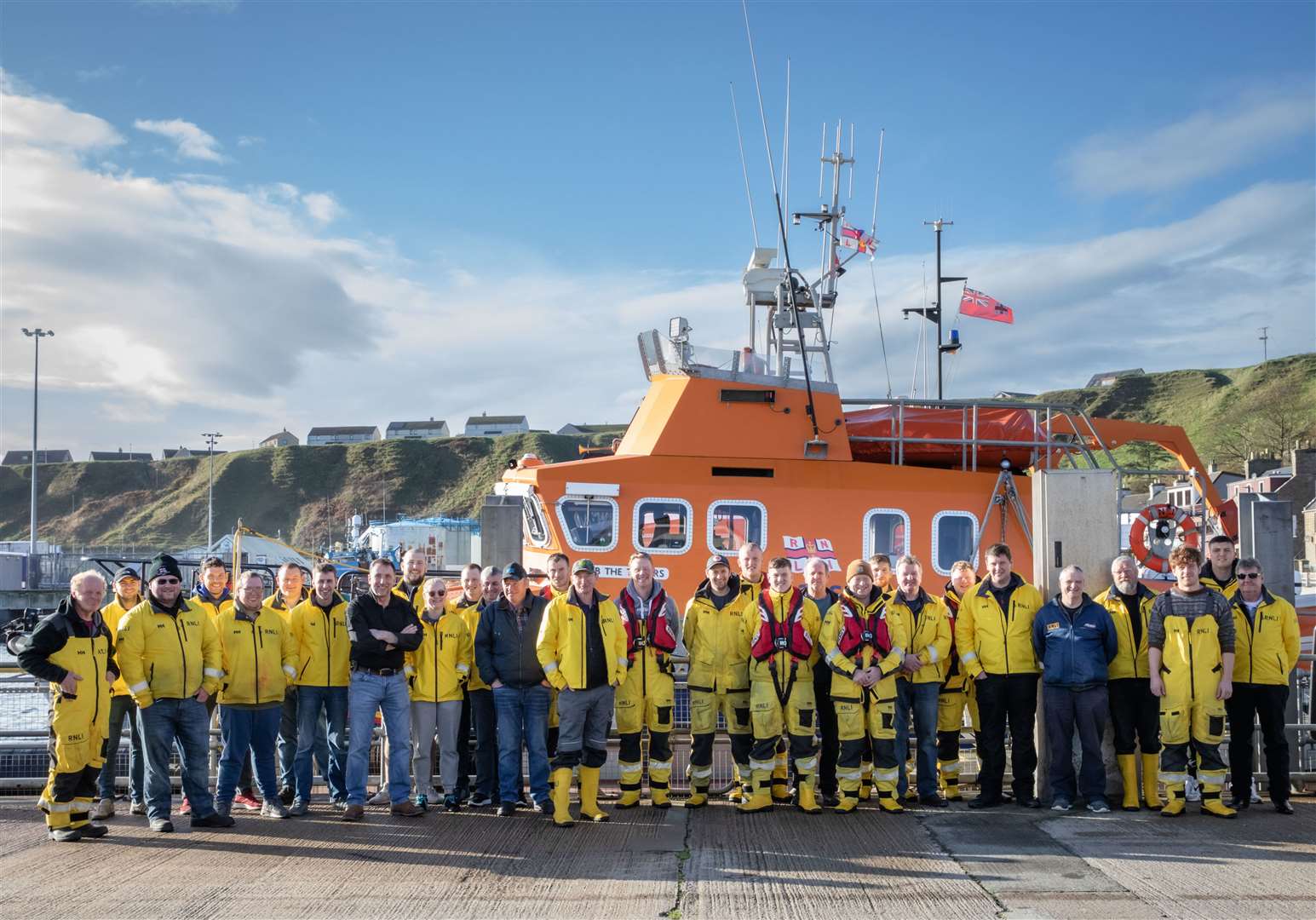 Lifeboat crew members from Thurso and Longhope, along with friends, joined Dougie for a barbecue after his last official training exercise. Picture: Karen Munro