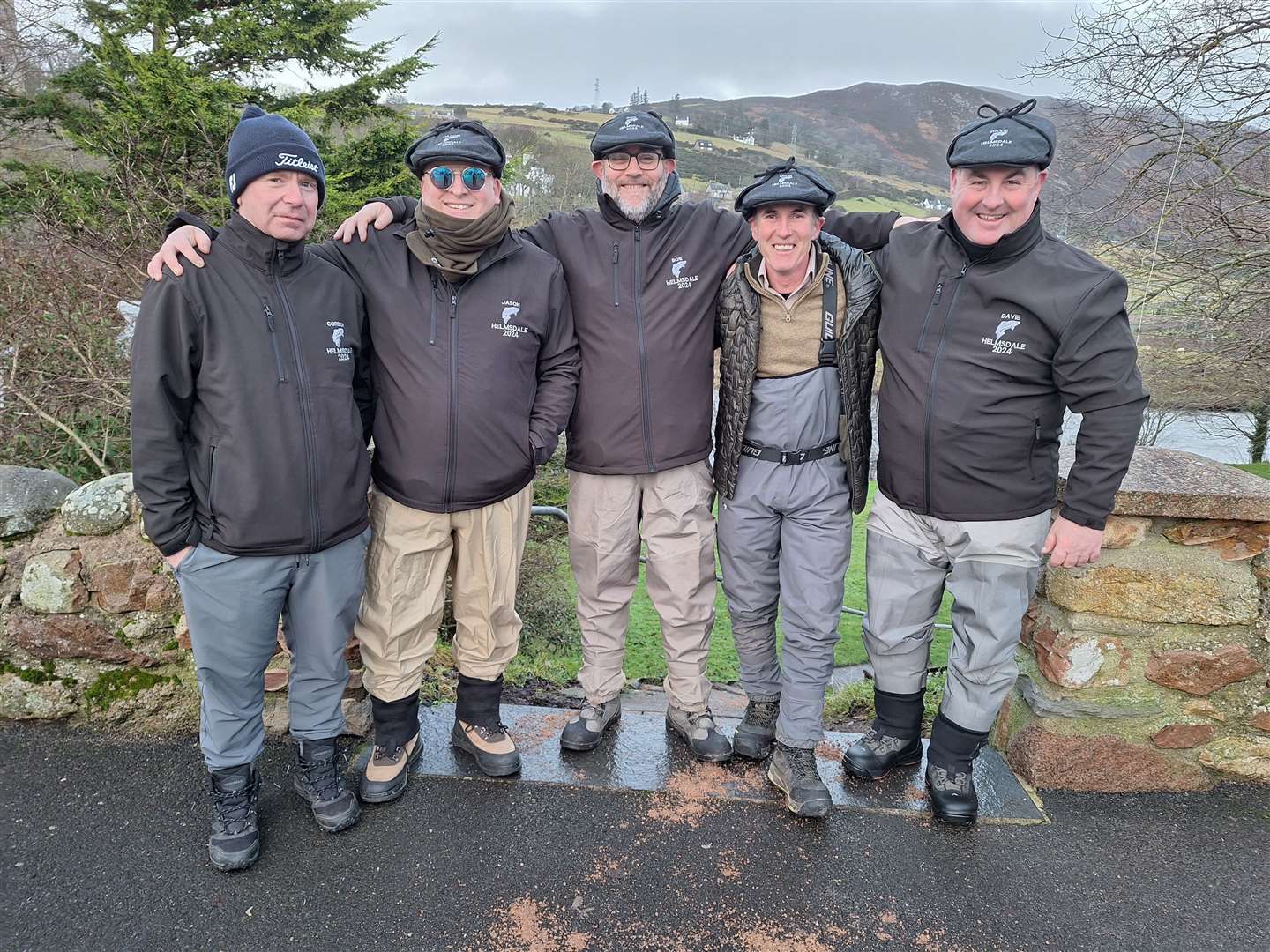 This group of friends from Glasgow are celebrating their tenth year of fishing the Helmsdale. Each year they wear personalised matching jackets and hats with their name, a salmon and 'Helmsdale' printed on them, along with the year. From left, Gordon Murray, Jason McRoberts, Bob Murray, Michael McAnenay and Davie Baird.