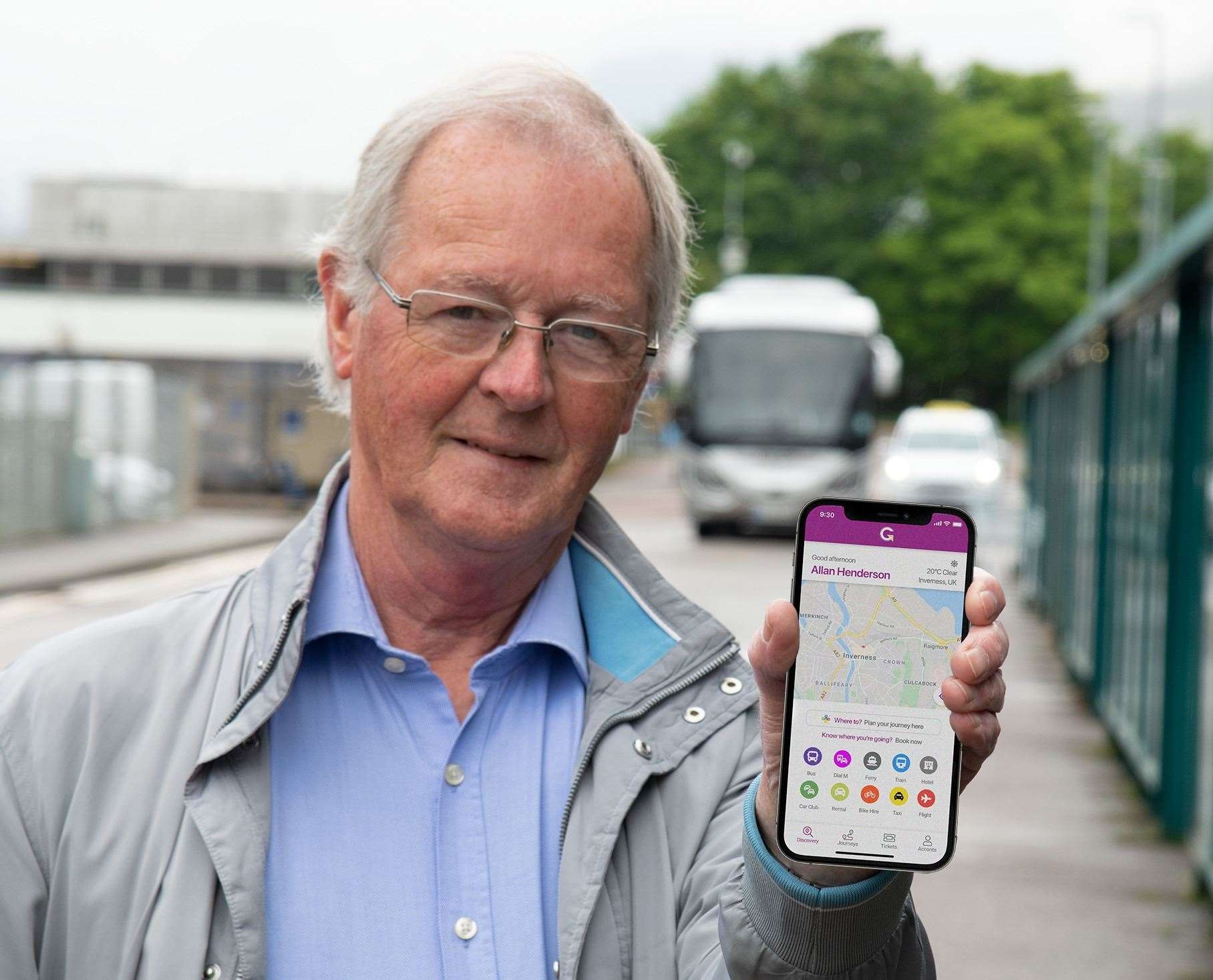 Councillor Allan Henderson, chairman of HiTrans, with a travel app launched earlier this summer to encourage greater use of public transport.