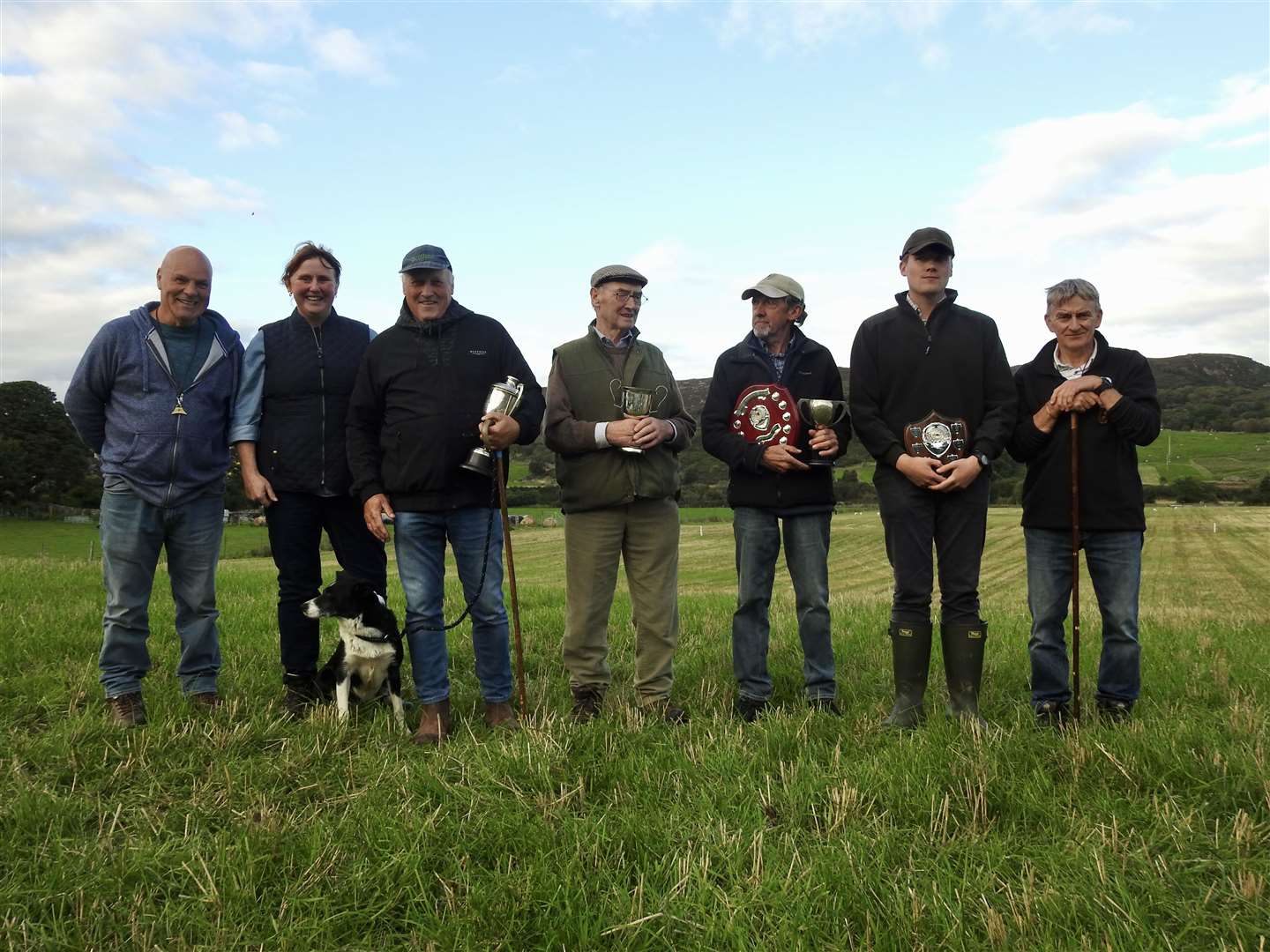 Winners at the 2021 Rogart sheepdog trials. From left, Tommy Macphee, Jasmine Grant, Ian Wilkie, Will Cormack, Derek Murray, Muir Grant and Dennis Simpson. Picture:Ruwan Uduwerage-Perera