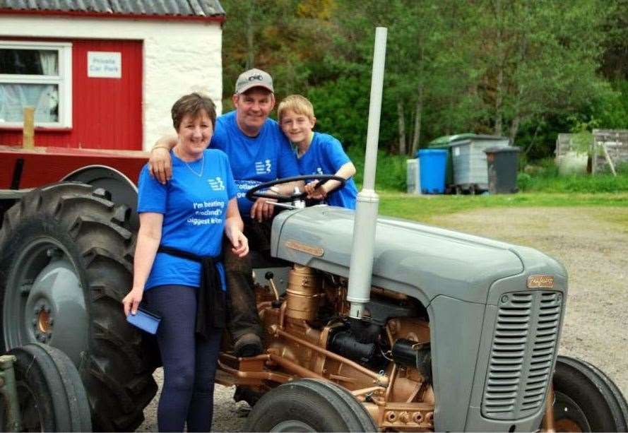 Gary Macangus, who founded the fundraising Gars Tractor Run in 2013, with his wife Catherine and son Ross.