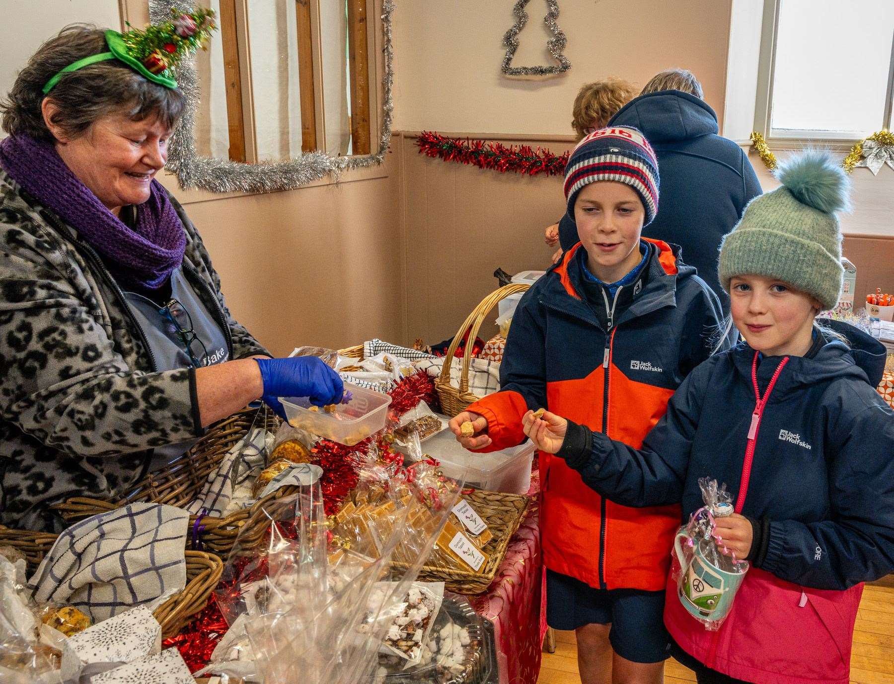 Euan and Morven Cameron sample some Dornoch Tablet from Mhairi Mackay's Dornoch-based Thistle Bake. Picture: Andy Kirby