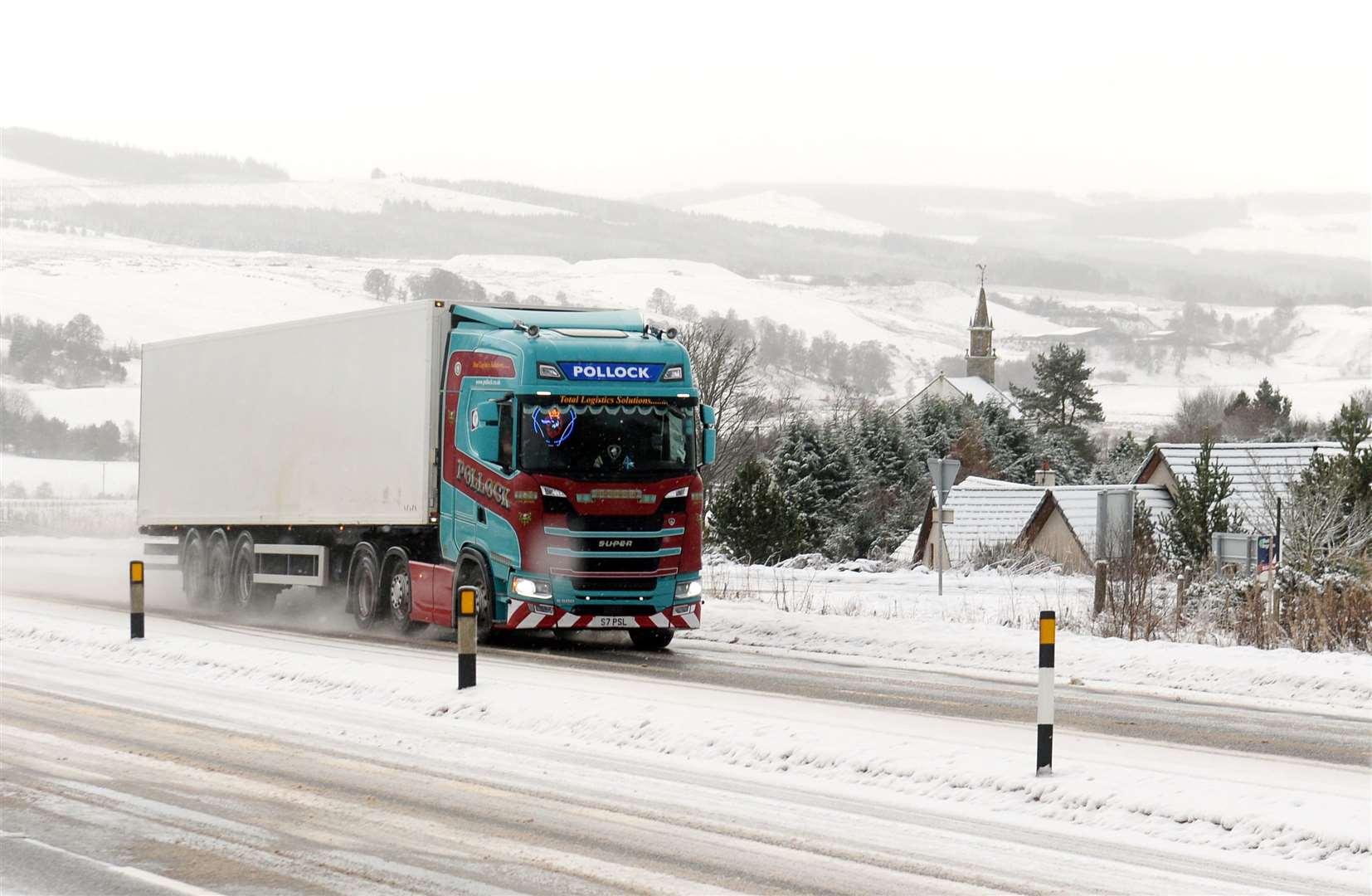 A lorry uses the snowy A9 south of Inverness on Wednesday. Picture: Gary Anthony