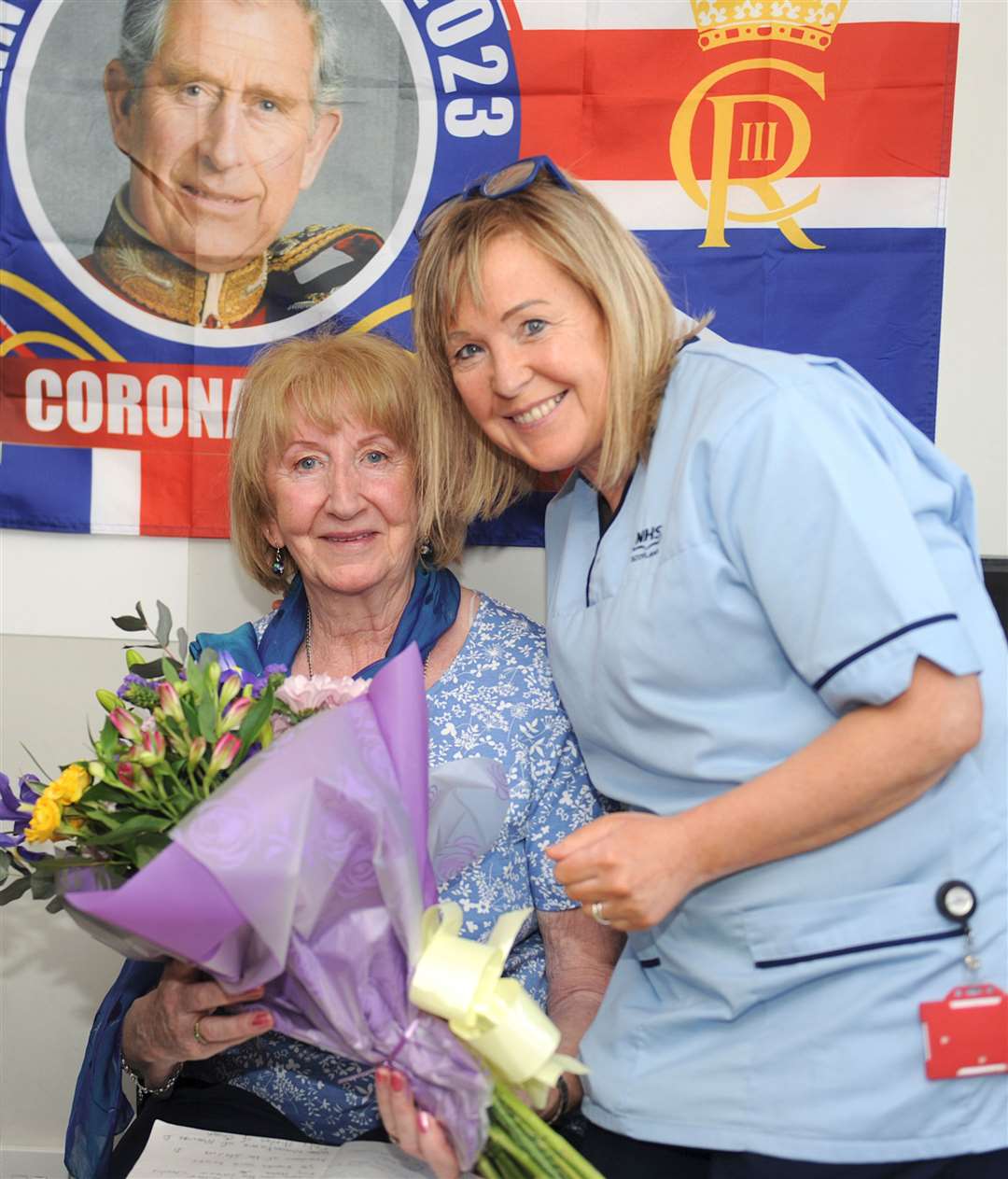 Jane Mackay was presented with flowers by Joanie Mackay-Shanks.