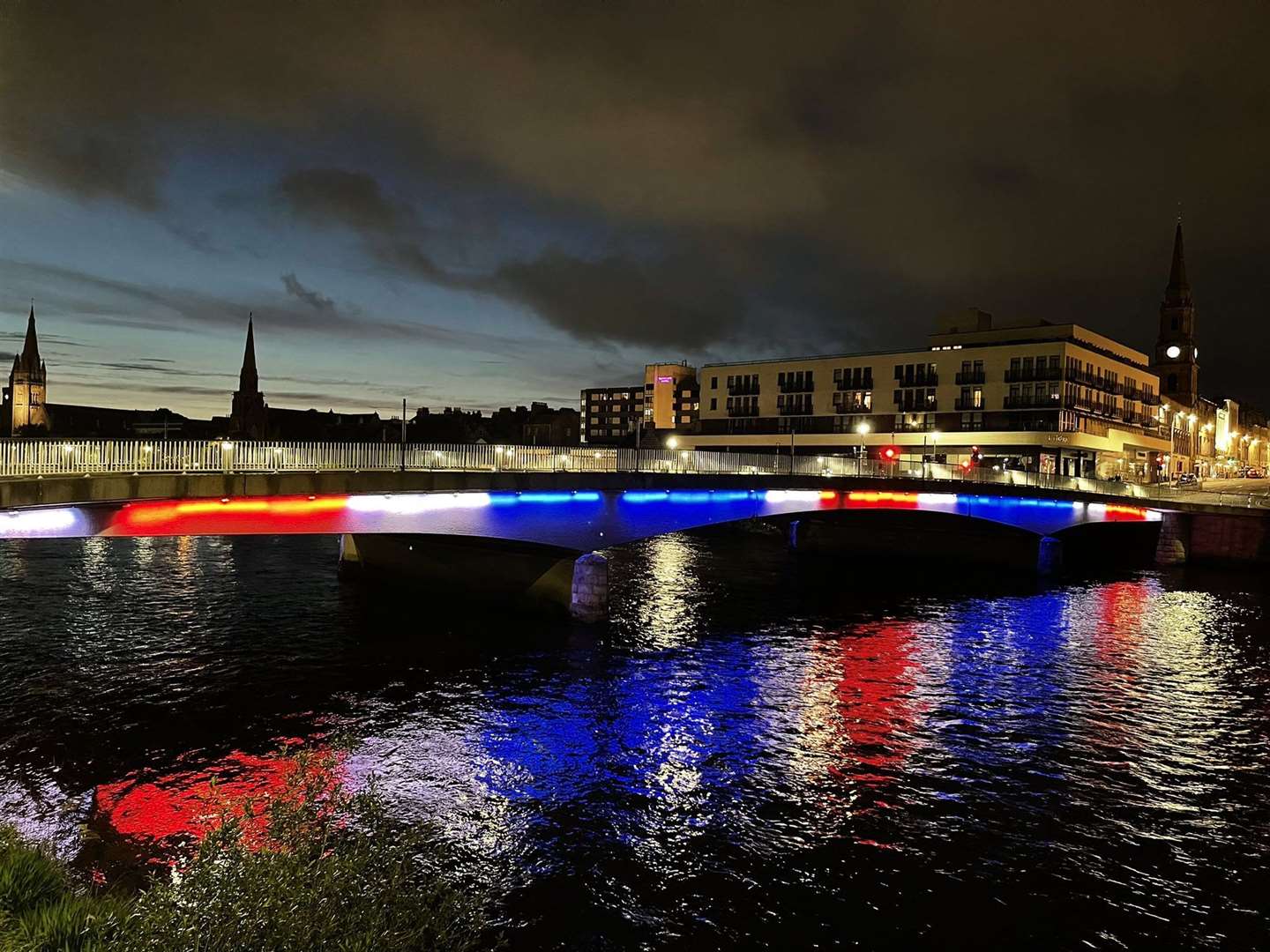 Ness Bridge lit up in the colours of the Union flag.
