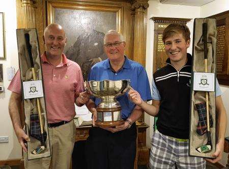 G K MacKay Trophy winners Gary and Graeme Bethune flank Dornoch captain Jim Seatter.