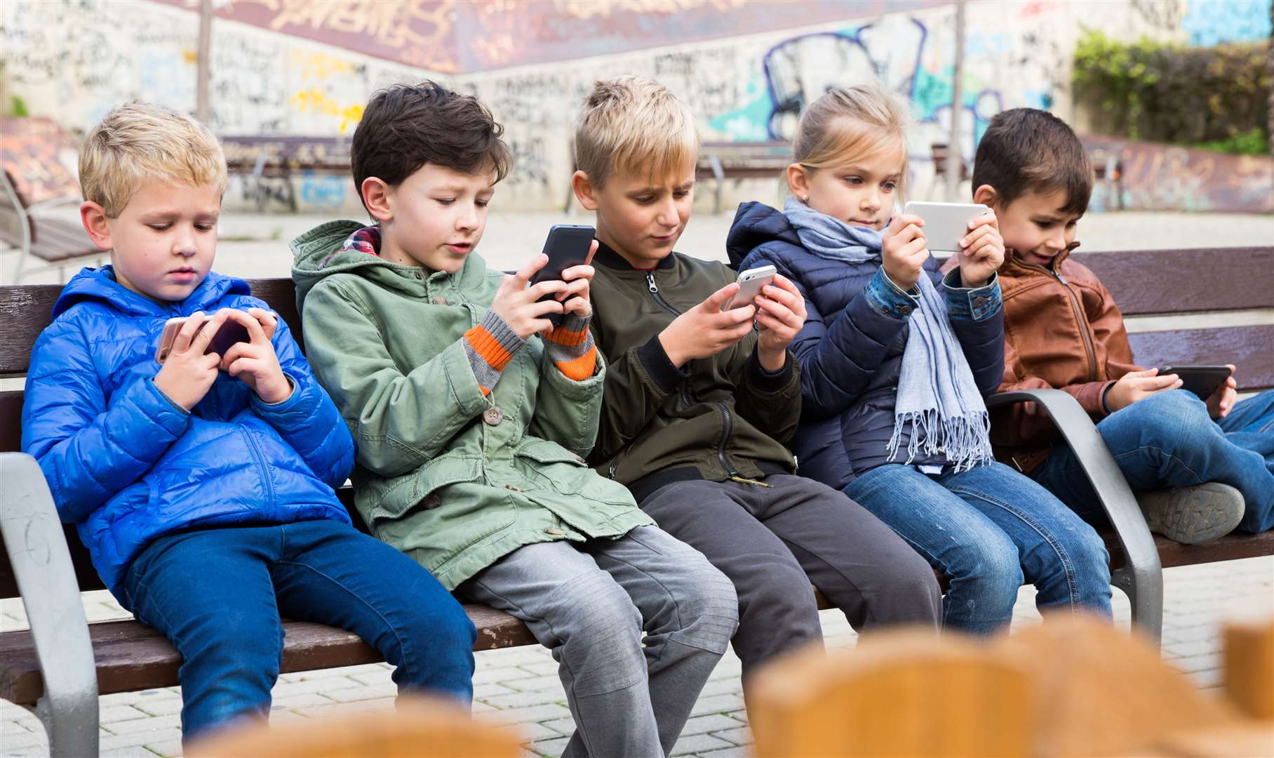 Youngsters are often too engrossed in their mobile phones to acknowledge a greeting.