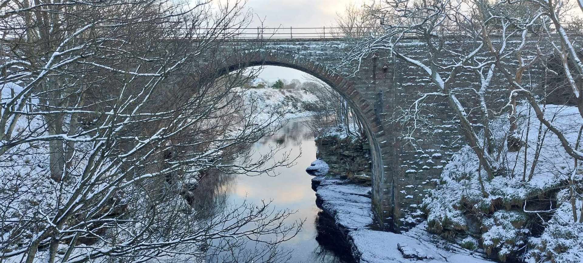 The River Brora running underneath Brora Bridge in the snow. Photo: Justine Clark