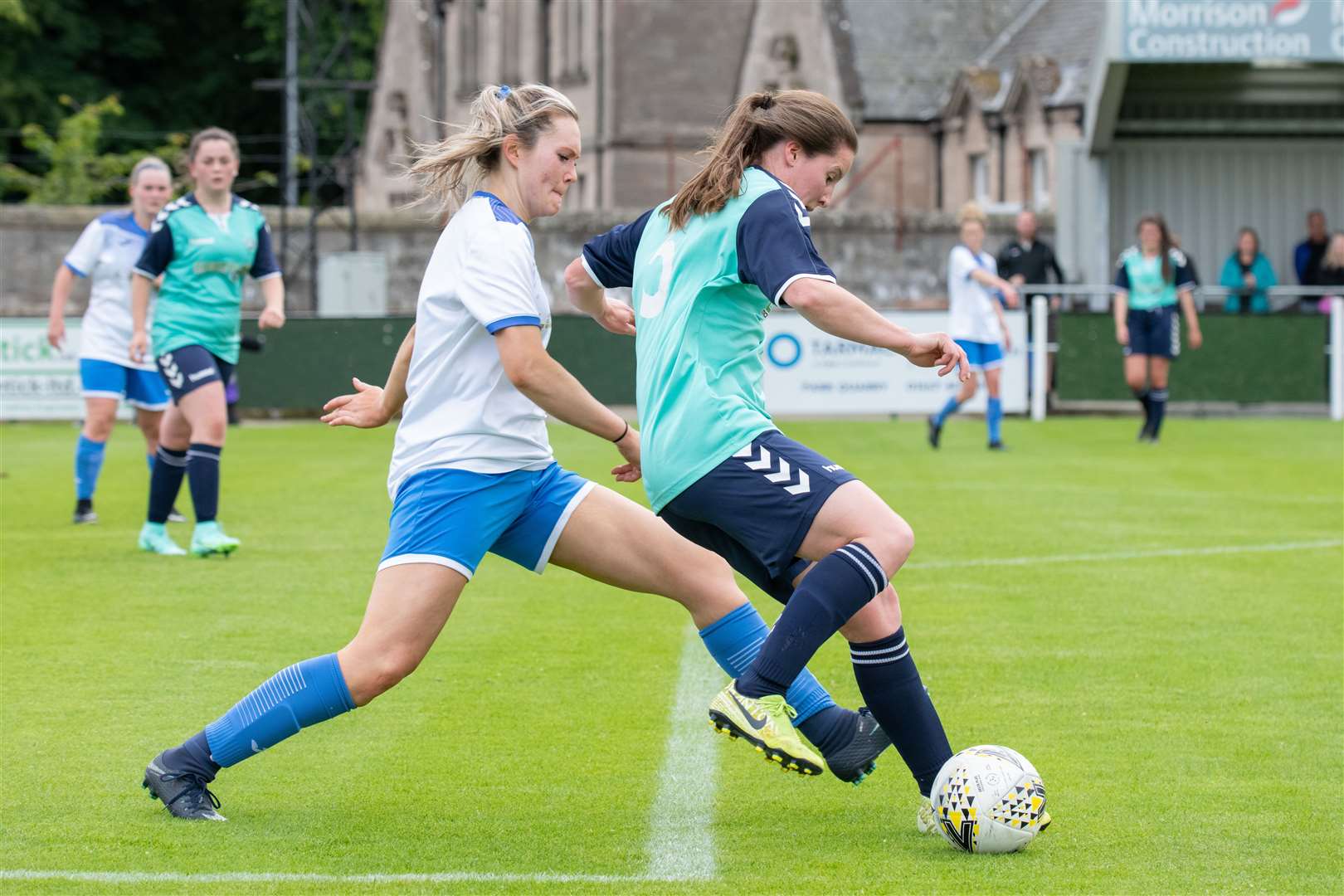 Sutherland right back Erin Johnstone keeps an eye on Buckie's Lorna Young. Picture: Daniel Forsyth