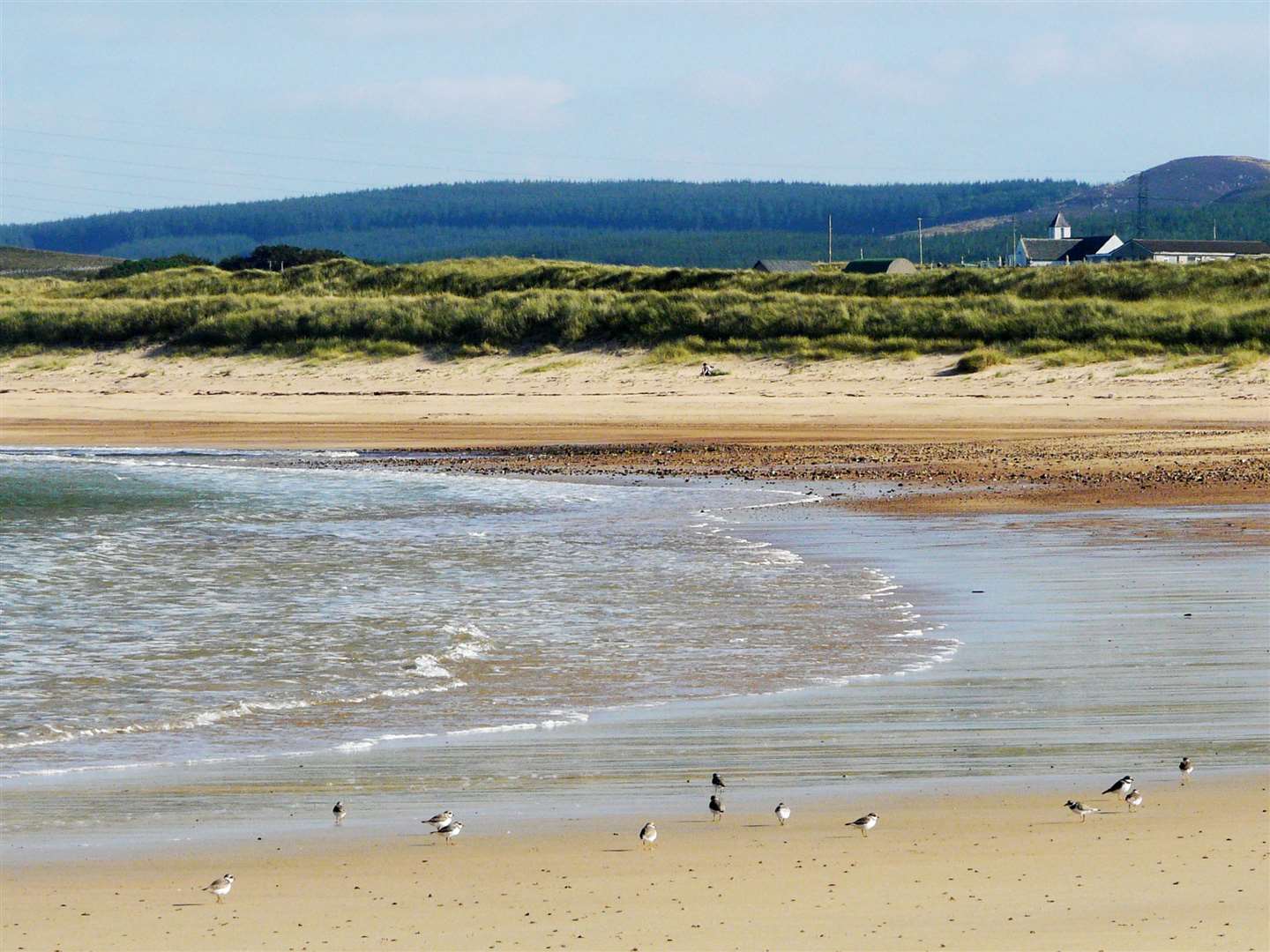 Sandside beach, with Reay's historic parish church in the distance.