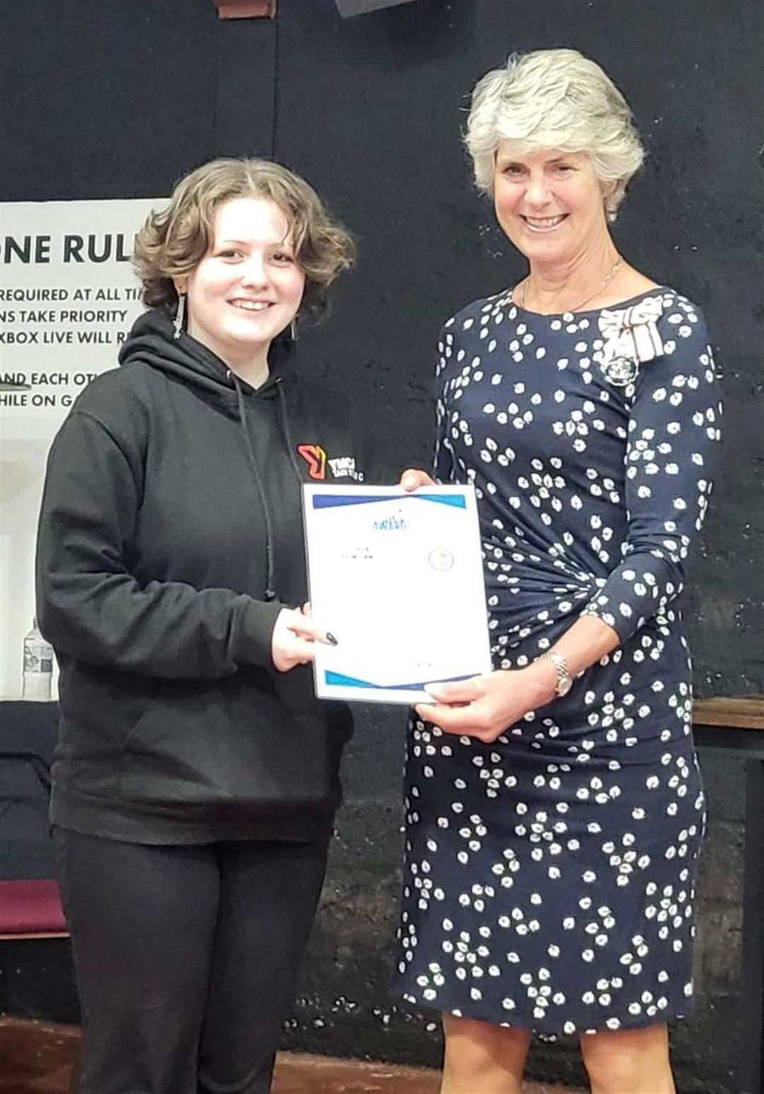 In recognition of volunteering for 200 hours, Dani Ritchie collected a Saltire award.