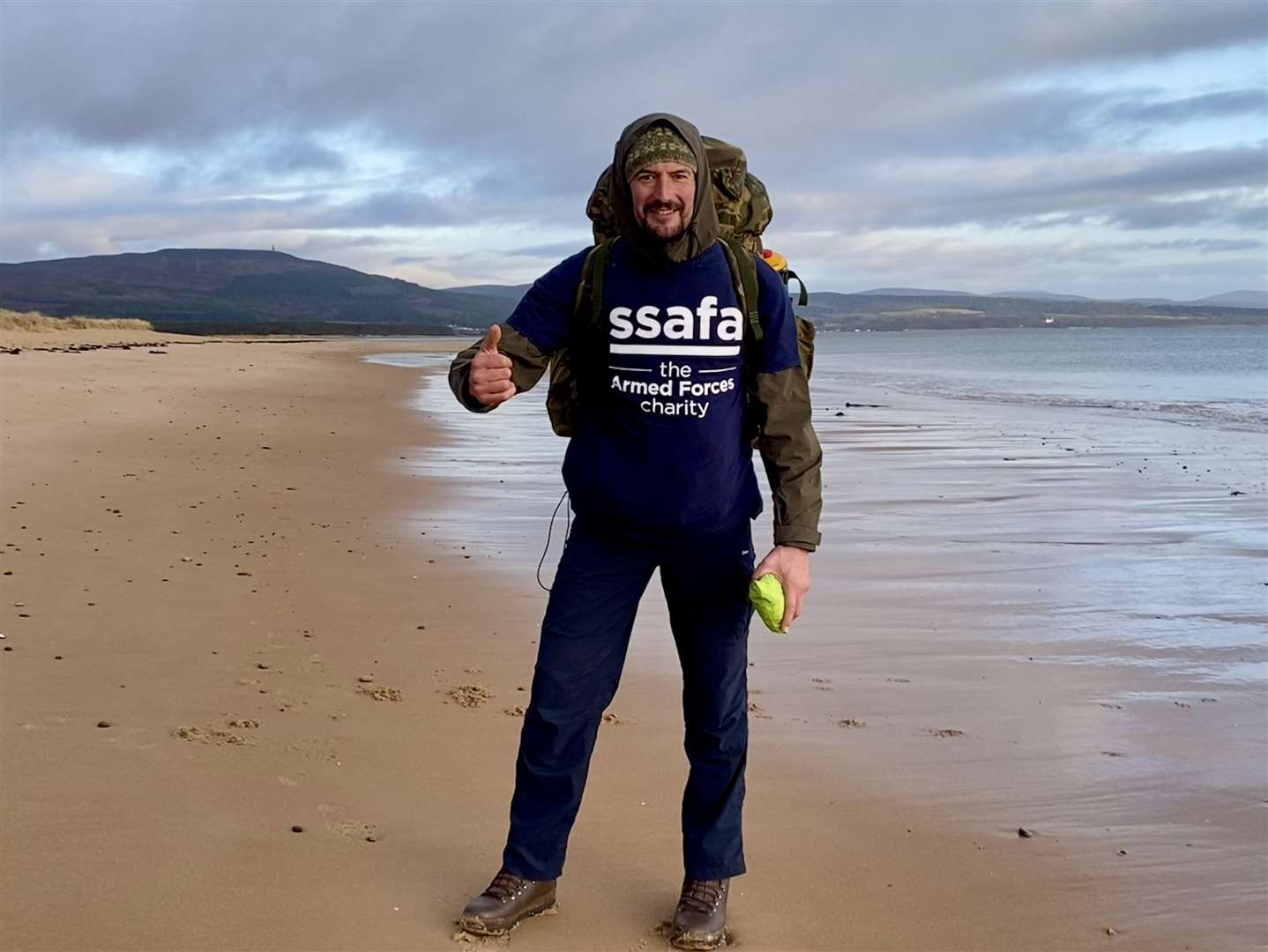 Russell at Embo beach on the Sutherland stretch of his travels. Photo: David Richardson