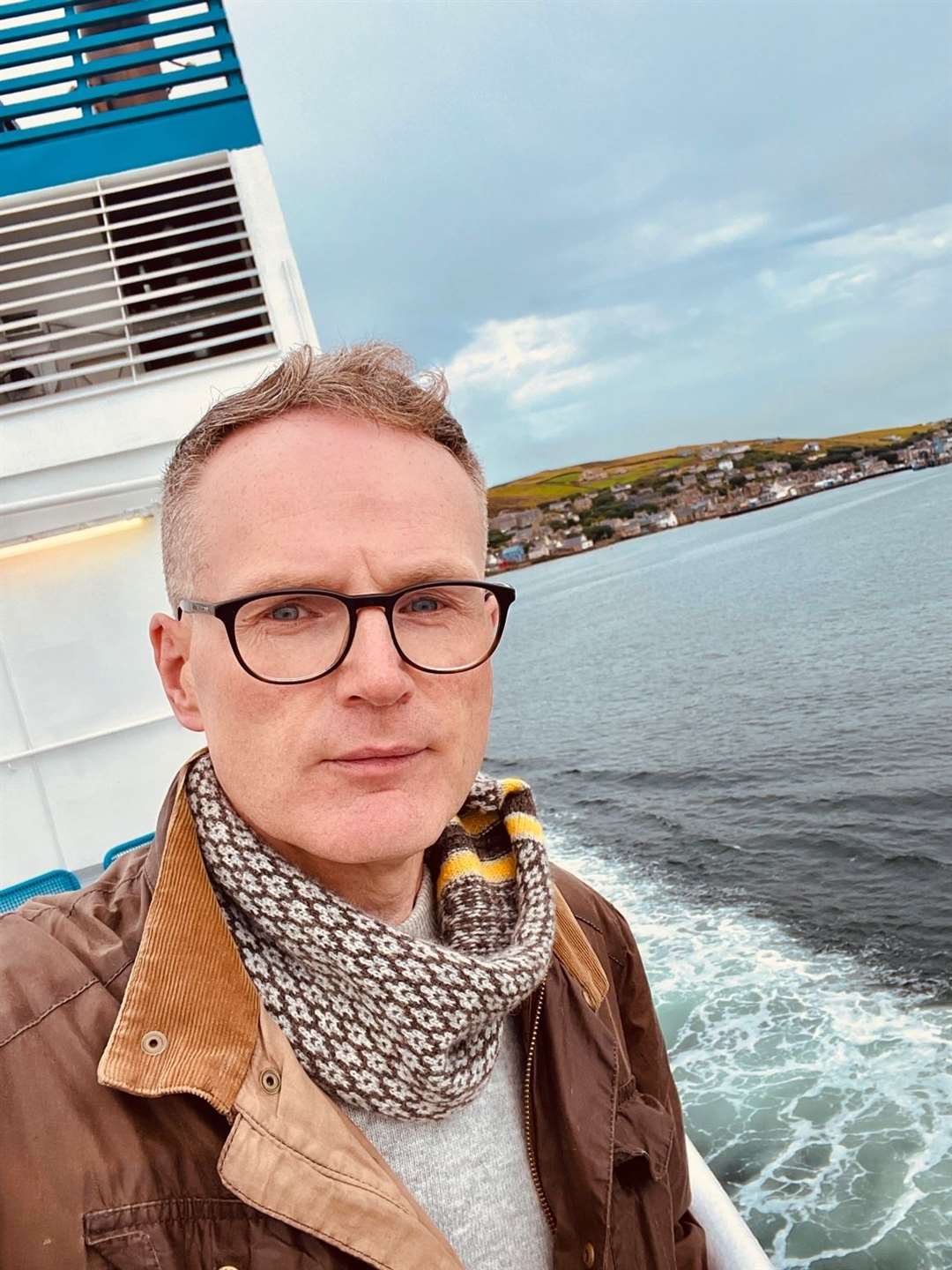 Filmmaker Robert Aitken on the ferry from Scrabster to Orkney.