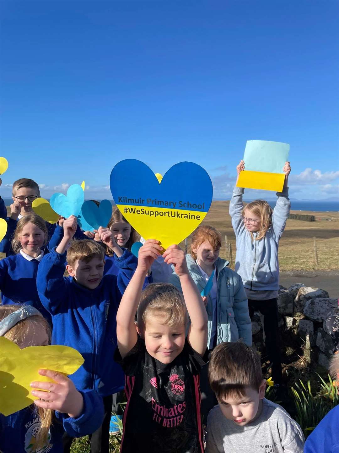 Kilmuir Primary School pupils show their support for Ukraine with blue and yellow paper hearts.