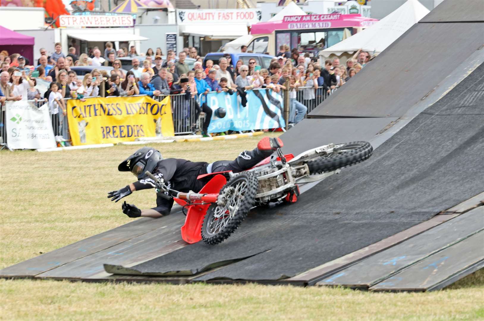 Stunt rider John Pearson of Broke FMX had a fall at the end of his final jump in the main ring. Picture: James Gunn