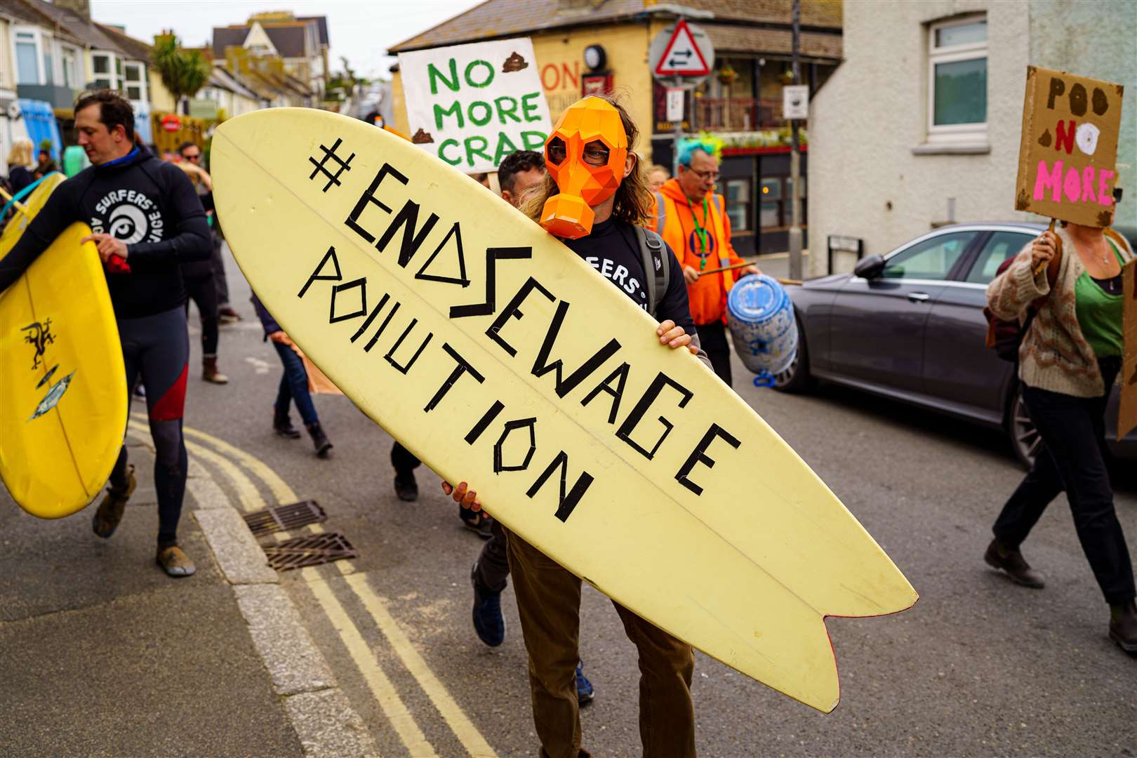 Campaigners took part in a National Day of Action on Sewage Pollution in April 2022 coordinated by Surfers Against Sewage (Ben Birchall/PA)