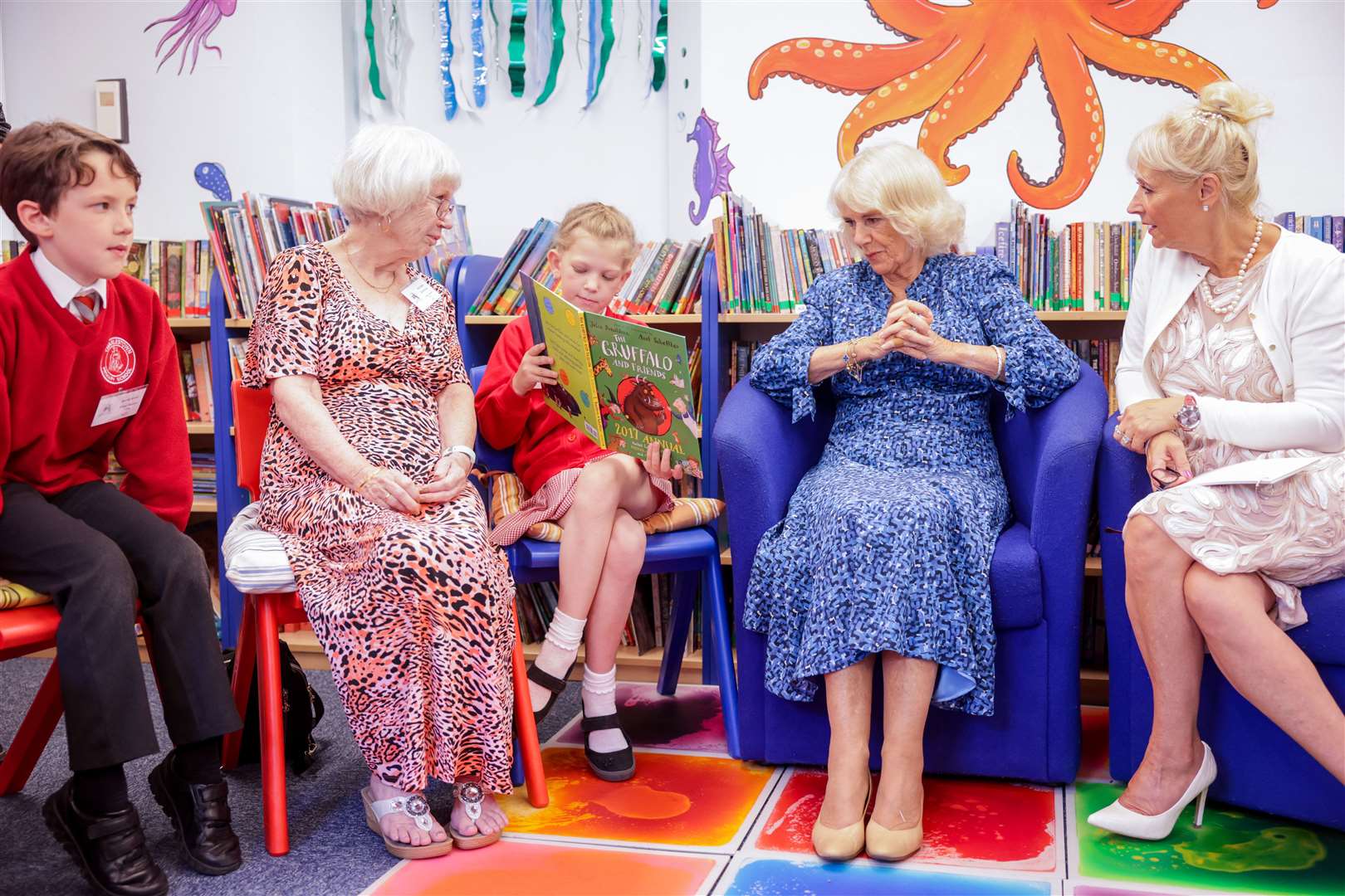 Camilla meets a small group of Silver Listeners and Silver Readers in the library at Charlestown School in St Austell (Chris Jackson/PA)