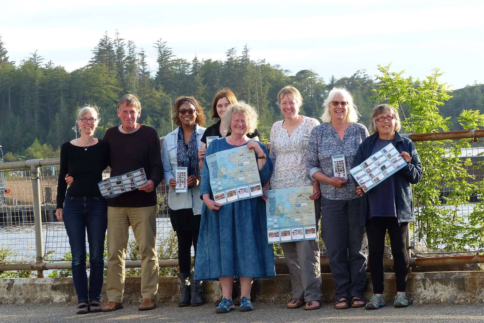 Assynt and Coigach Creatives committee members show off copies of the new leaflet.