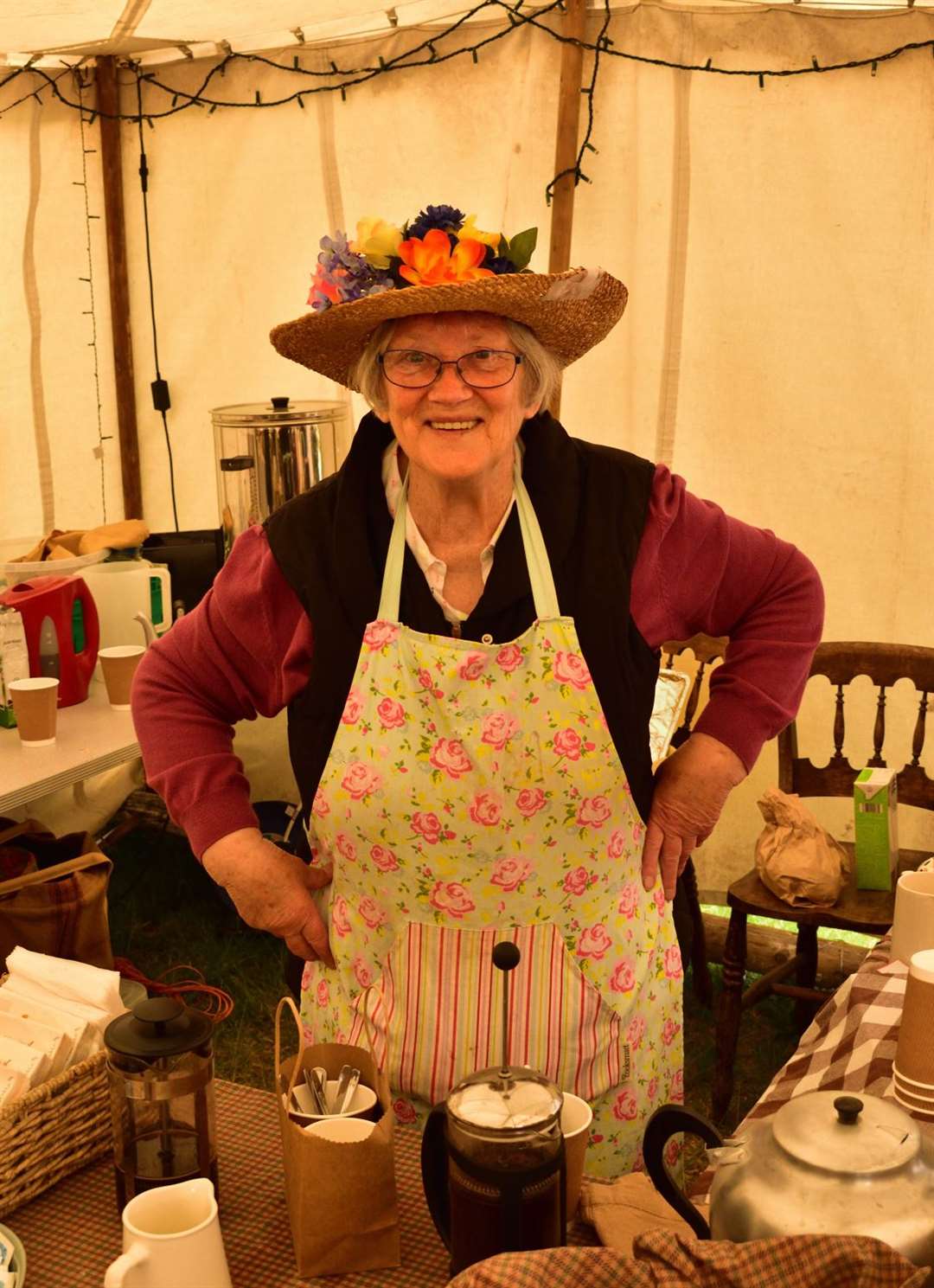 Anna Sutherland wore a glorious hat to serve the teas.